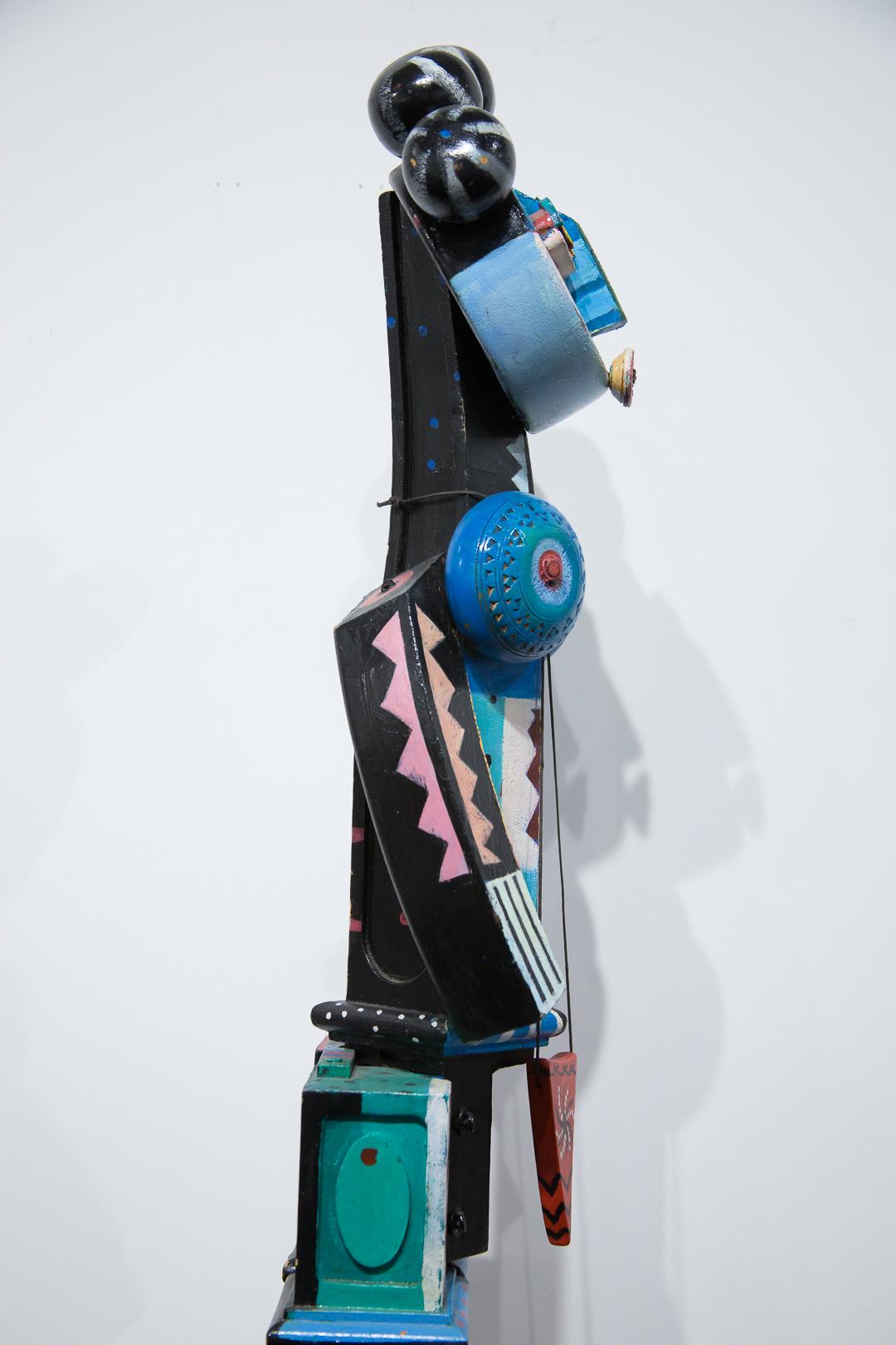 “Abstract Woman” is one of Calloway’s  eclectic  sculptures. It is made of found objects that he has organized into what can be recognized as a female body and painted in numerous colors and designs that produce a delightful piece of art. The