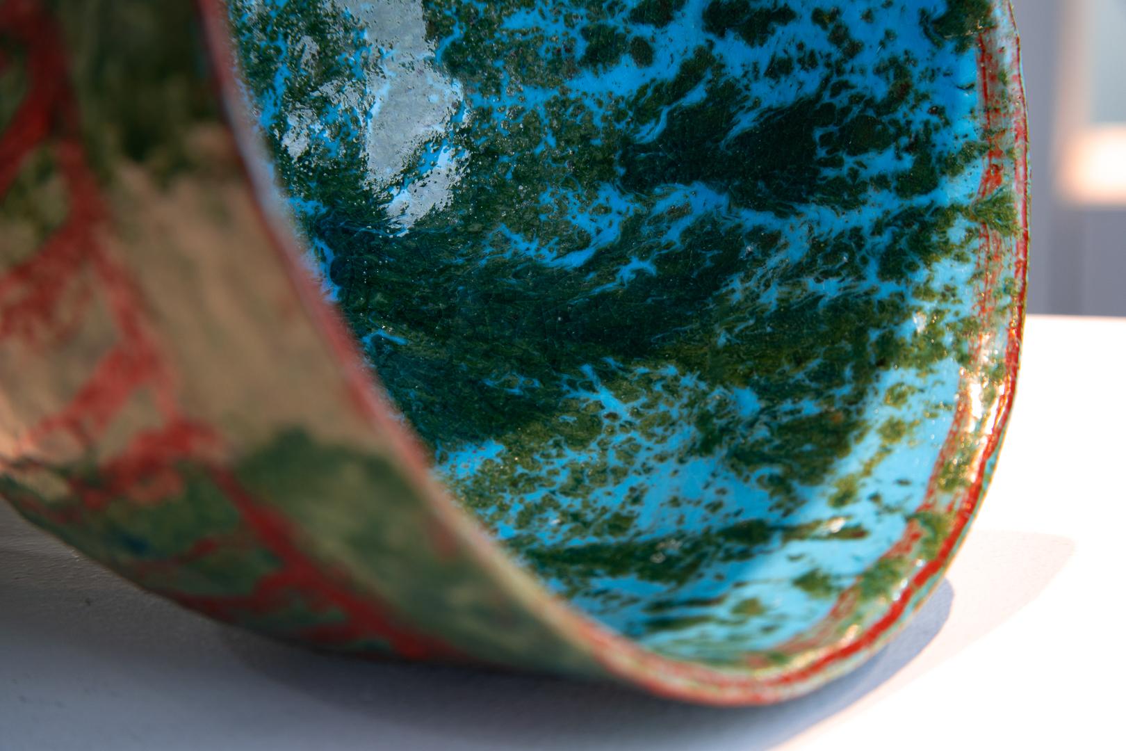 “Monumental Chalice” is a stunning rare monumental ceramic chalice by the world re-known Italian potter Guido Gambone. The shape is light and delicate with a comfortable weight. Turquoise and green glaze the piece in a lovely mixture of colors with