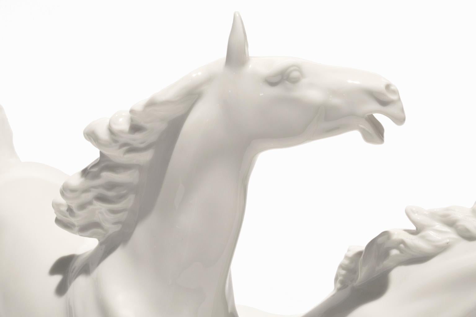 This gorgeous porcelain sculpture from Hutschenreuther porcelain is of two galloping horses, sculpted in exquisite detail and signed by the sculptor, Max Hermann Fritz. Max Hermann Fritz, or MH Fritz, was born in 1873 in Neuhaus and studied under