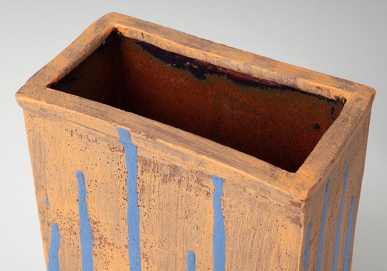 Slab built rectangular stoneware vessel. Multi fred with under glazes and a deep mottled red liner glaze. 

Marc Cohen has over 30 years of experience as a professional photographer, printmaker and artist. He lives and works in New Jersey.