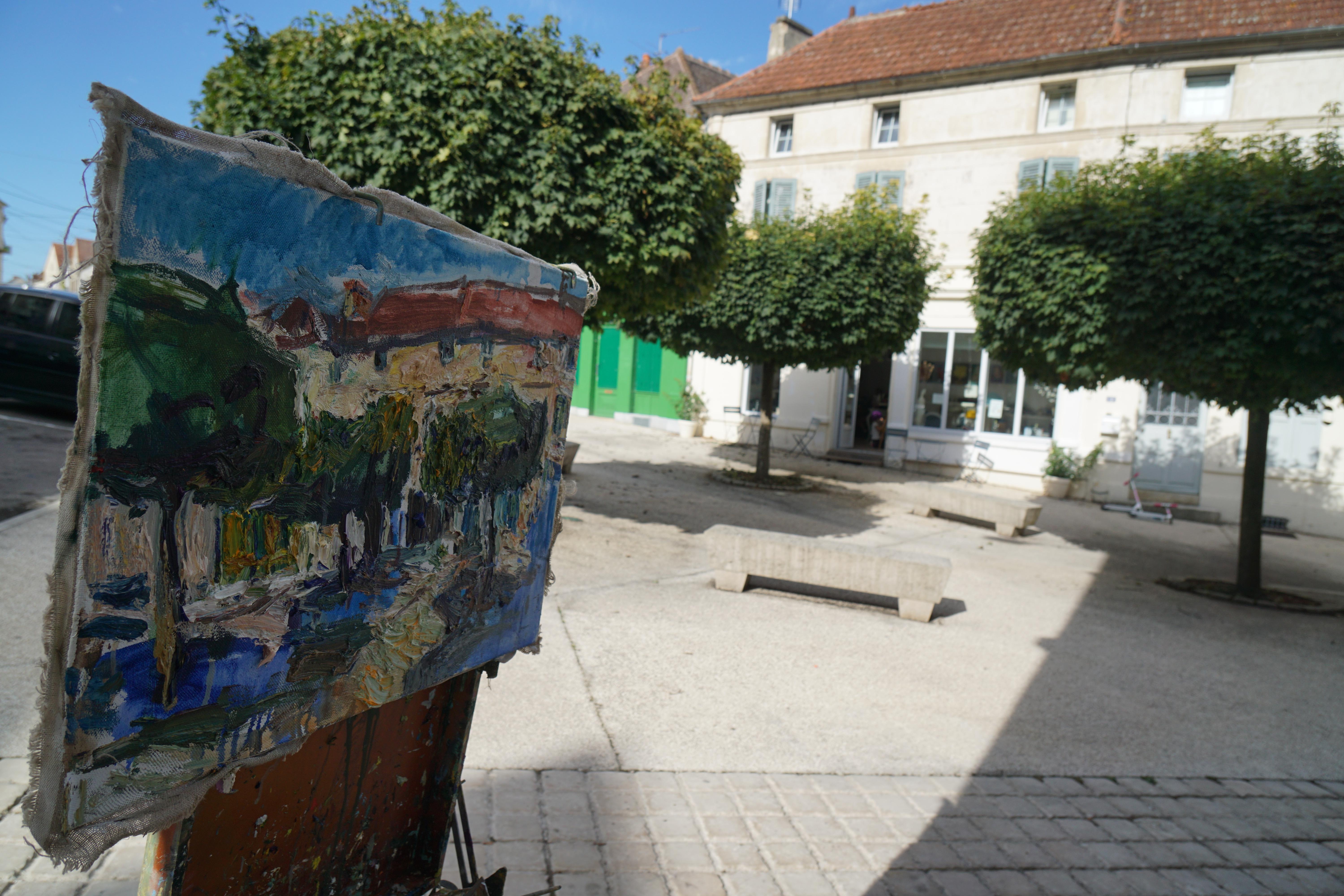 Peinture à l'huile « The Central Square of Ravires » (La rue centrale des Ravires) - Painting de Ulrich Gleiter