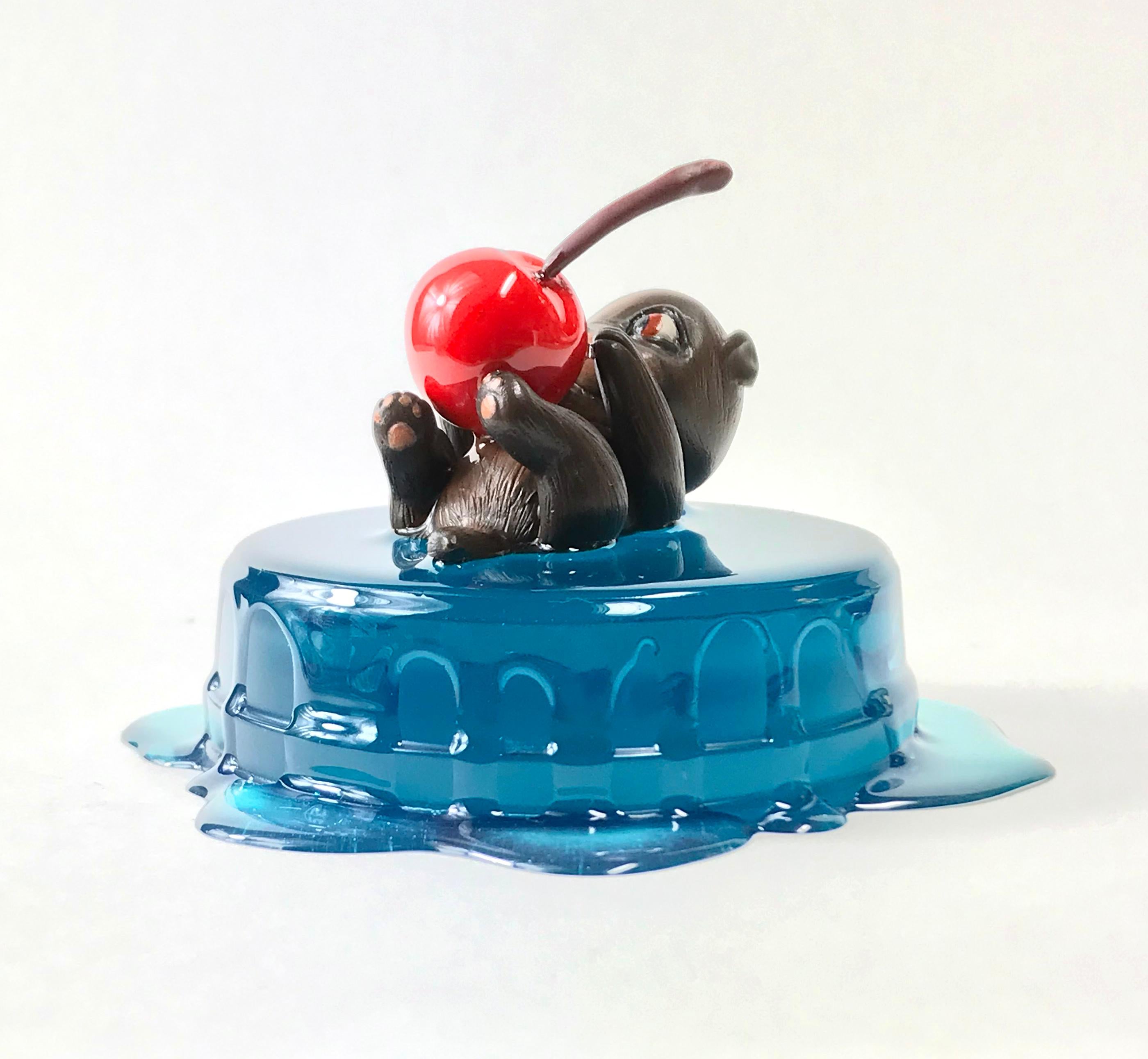 Otter on blue pastry