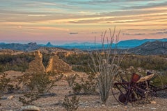 Days - West Texas Hill Country landscape with sunset, flora, and wagon wheels