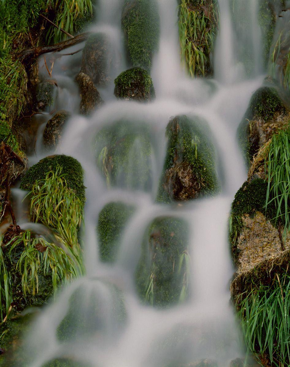 Joe Aker Landscape Photograph - Flowing Water - Misty waterfall nature landscape w/ rocks & lush green plants