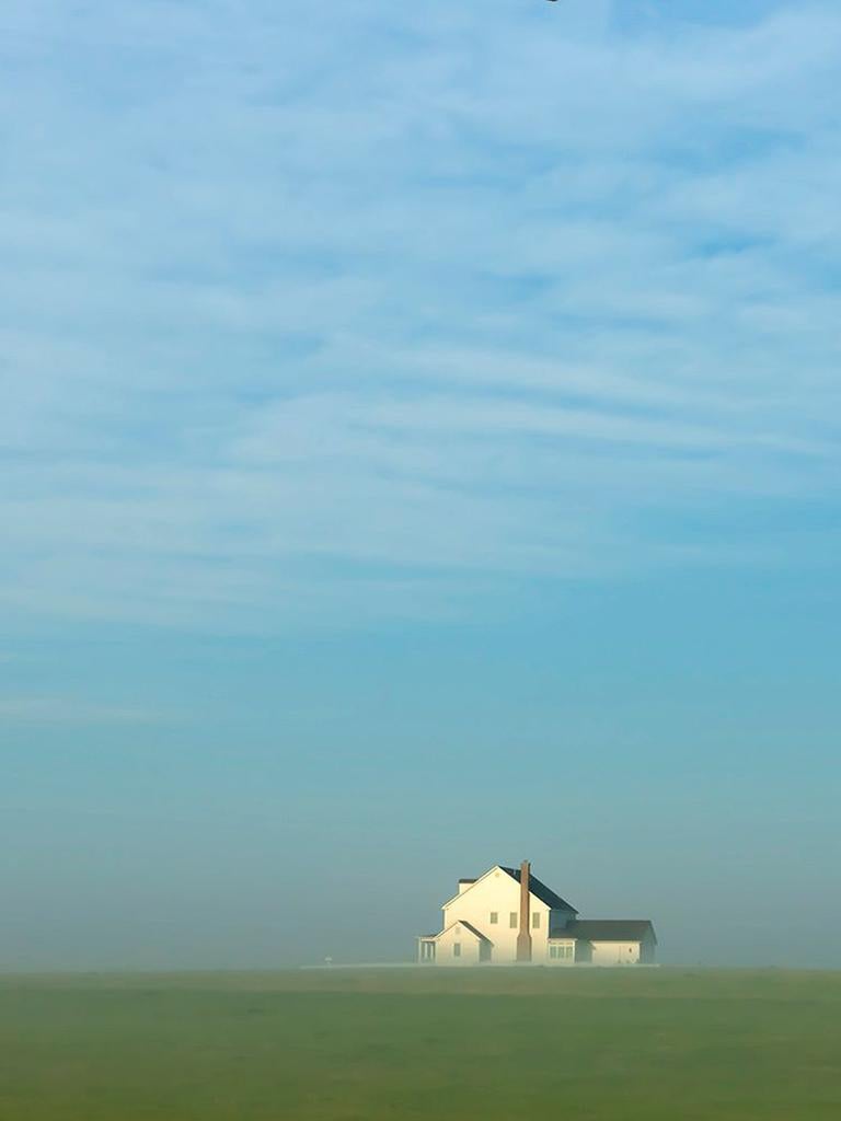 A Texas Sunrise - Rural farm landscape and sky with white house, red barn & moon - Photograph by Fikry Botros