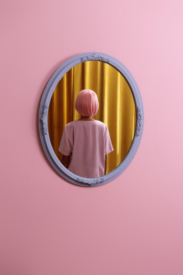 Karen Navarro Abstract Photograph - I don't see myself - Abstract pop pink & yellow self-portrait in oval mirror