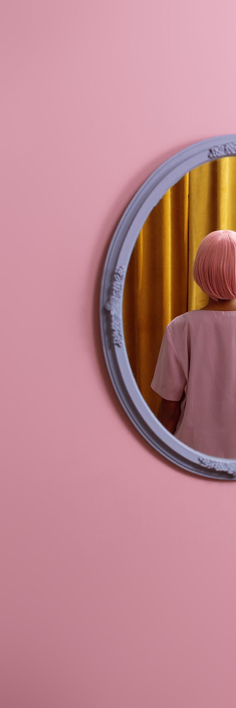I don't see myself - Abstract pop pink & yellow self-portrait in oval mirror - Photograph by Karen Navarro