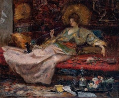“LADY PLAYING WITH KITTENS IN AN ORIENTALISING INTERIOR”