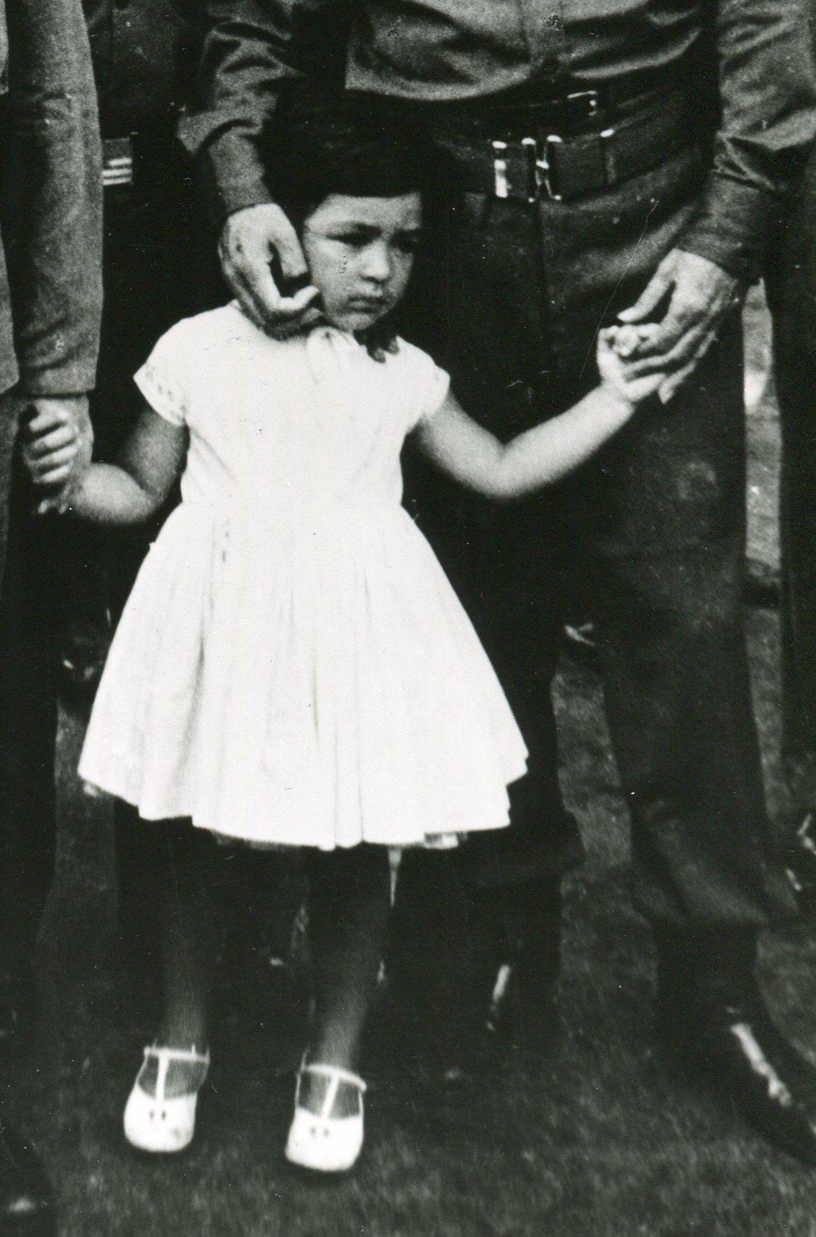 Che Guevara with his daughter - Photograph by Osvaldo Salas