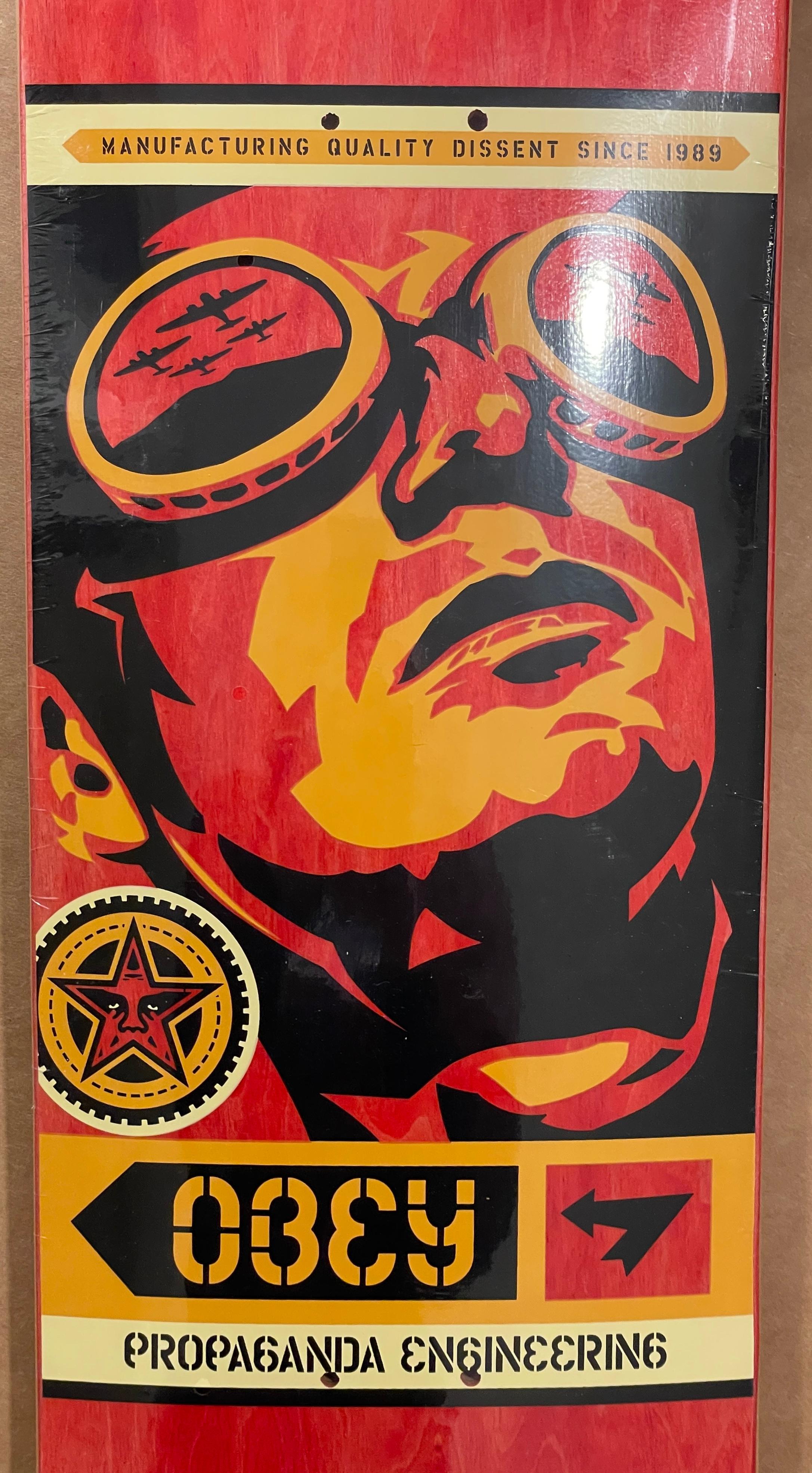 Shepard Fairey 30th Anniversary Skateboard 

Edition Details:
Year:	2019
Class:	Skate Deck
Status:	Official
Size:	8.5 X 32
Unsigned
Still sealed in shrink wrap
Total Edition size:  271/300