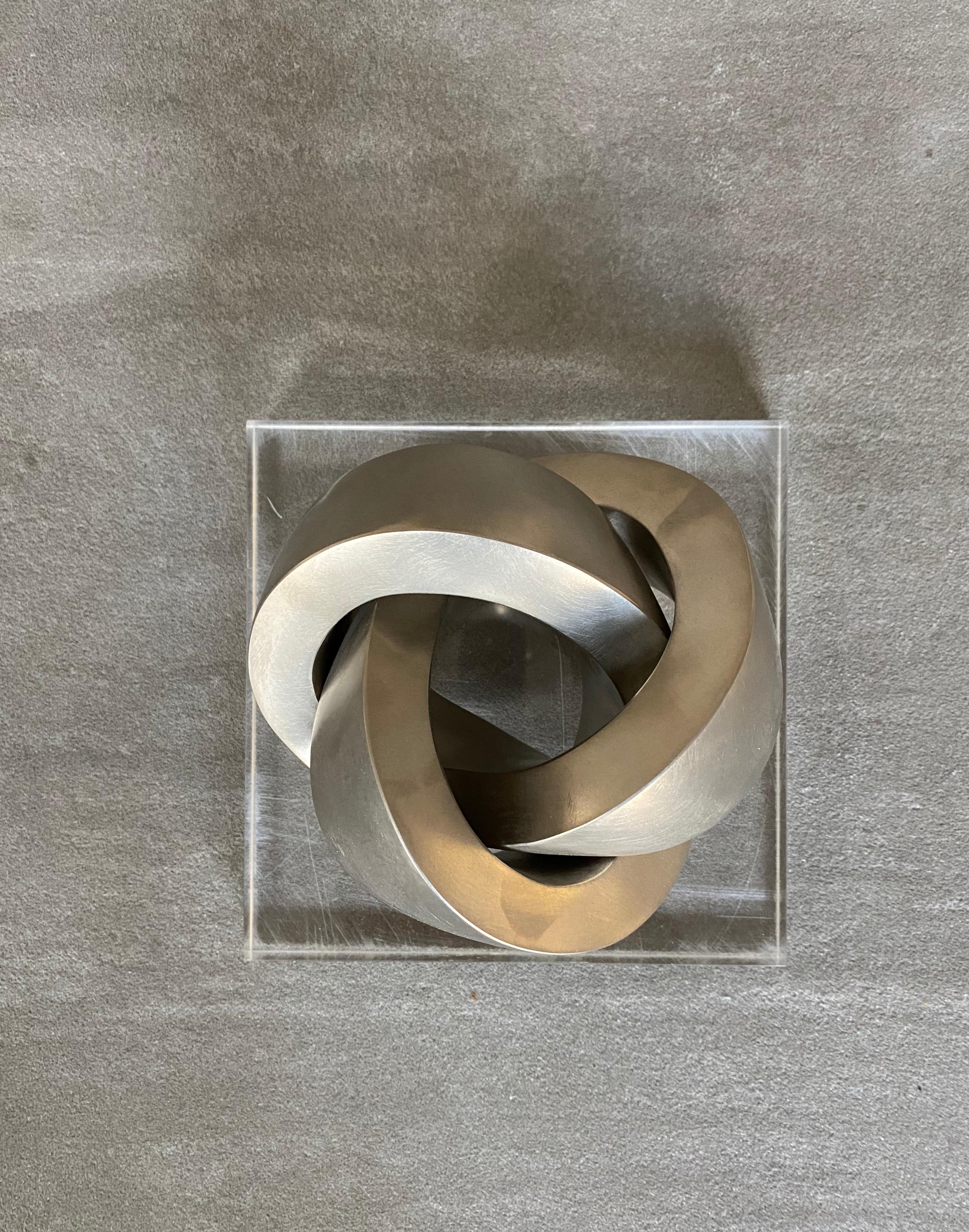 silver knot sculpture