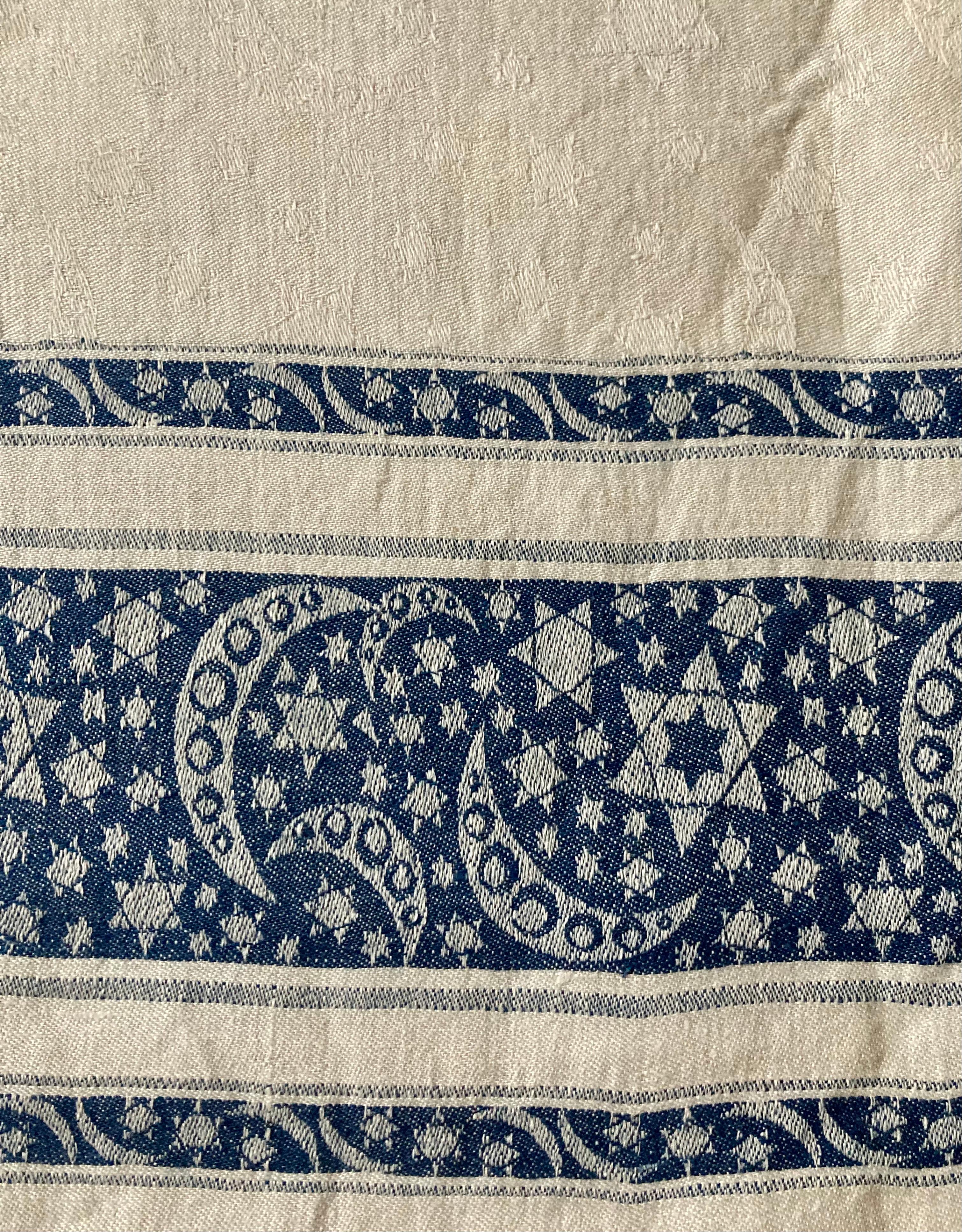 Linen Serviette 12 pieces / 1 plain white, 11 white with blue embroided, size 40x40 cm, Linen table cloth white and blue, linen, size 150x260 cm. Judaica, date probably beginning of the 20th Century.