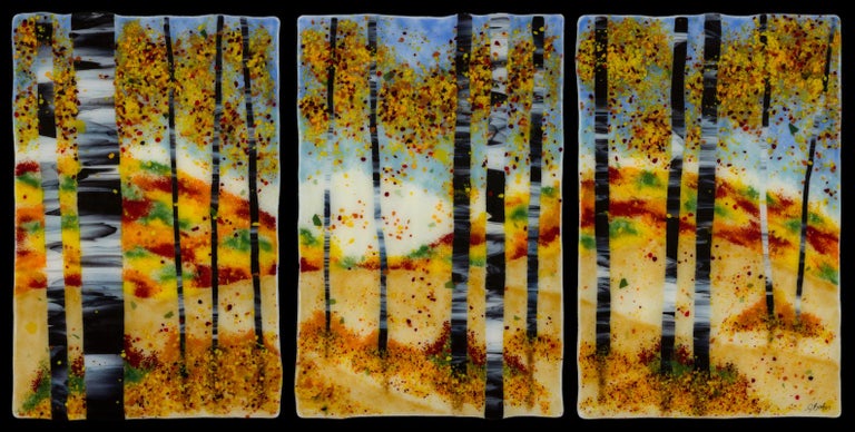 Made entirely of glass, each colorful, fine art,  kiln formed panel in this landscape triptych measures approximately 24"H x 16"W. The 50" width measurement allows for 1" spacing between the panels.  The panels are backed with a thin sheet of metal