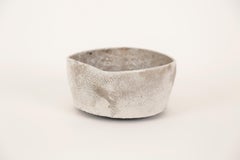 "RAKU RED AND WHITE", wheel formed white glaze, copper red, gold leaf, sculpture