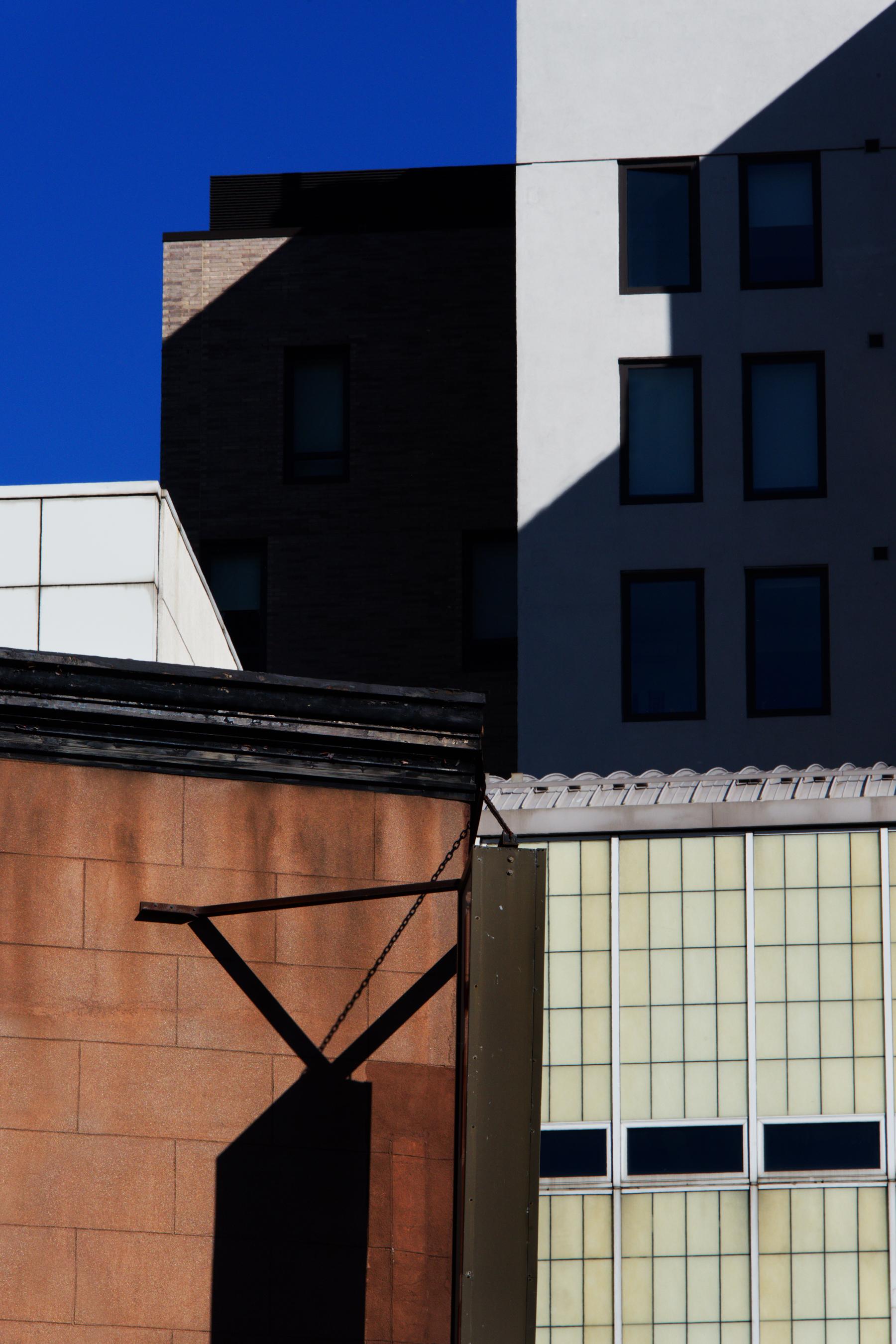 Bob Krasner Color Photograph - "Brooklyn Downtown", photograph, city, architecture, building, geometry, four