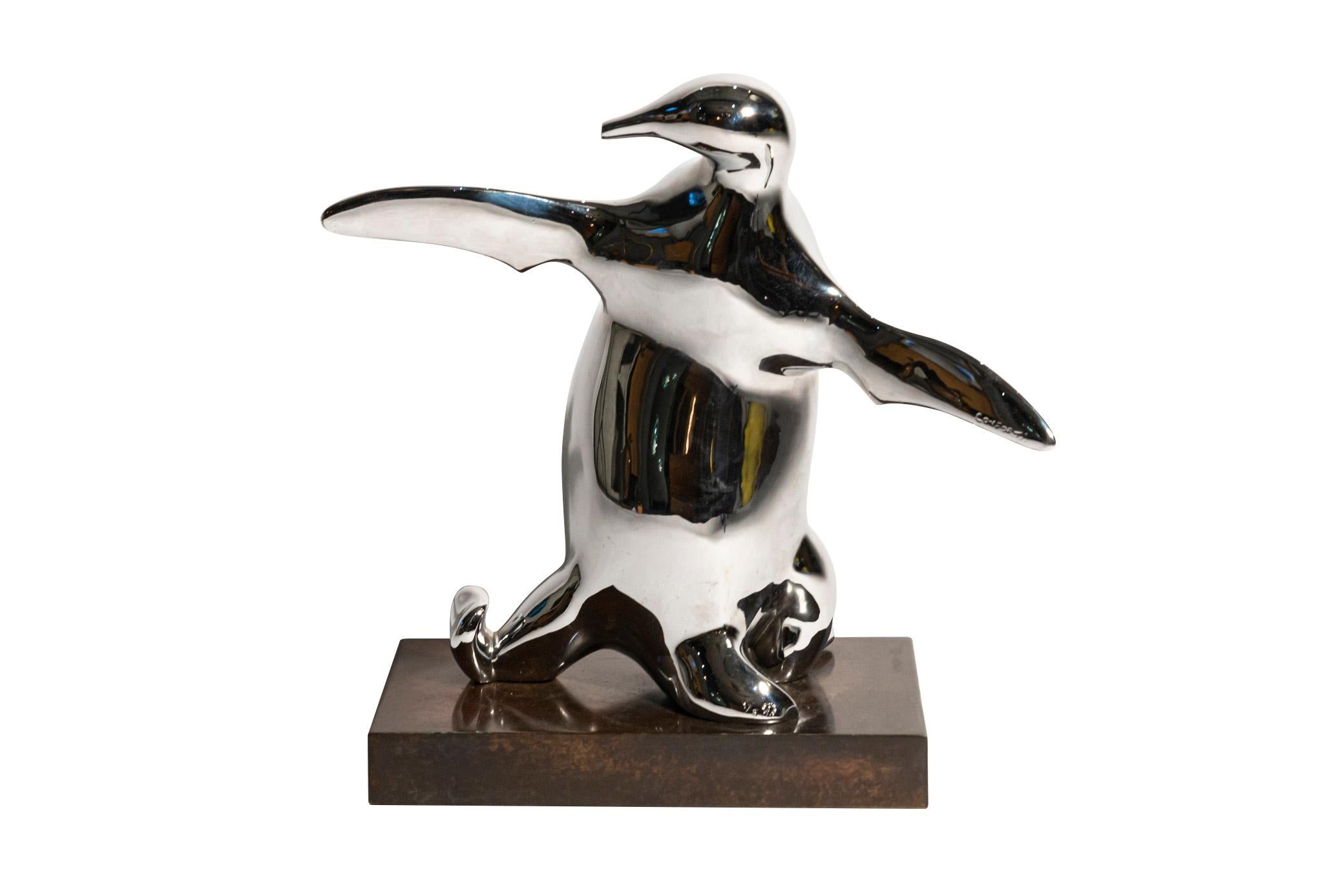 metal penguin sculpture