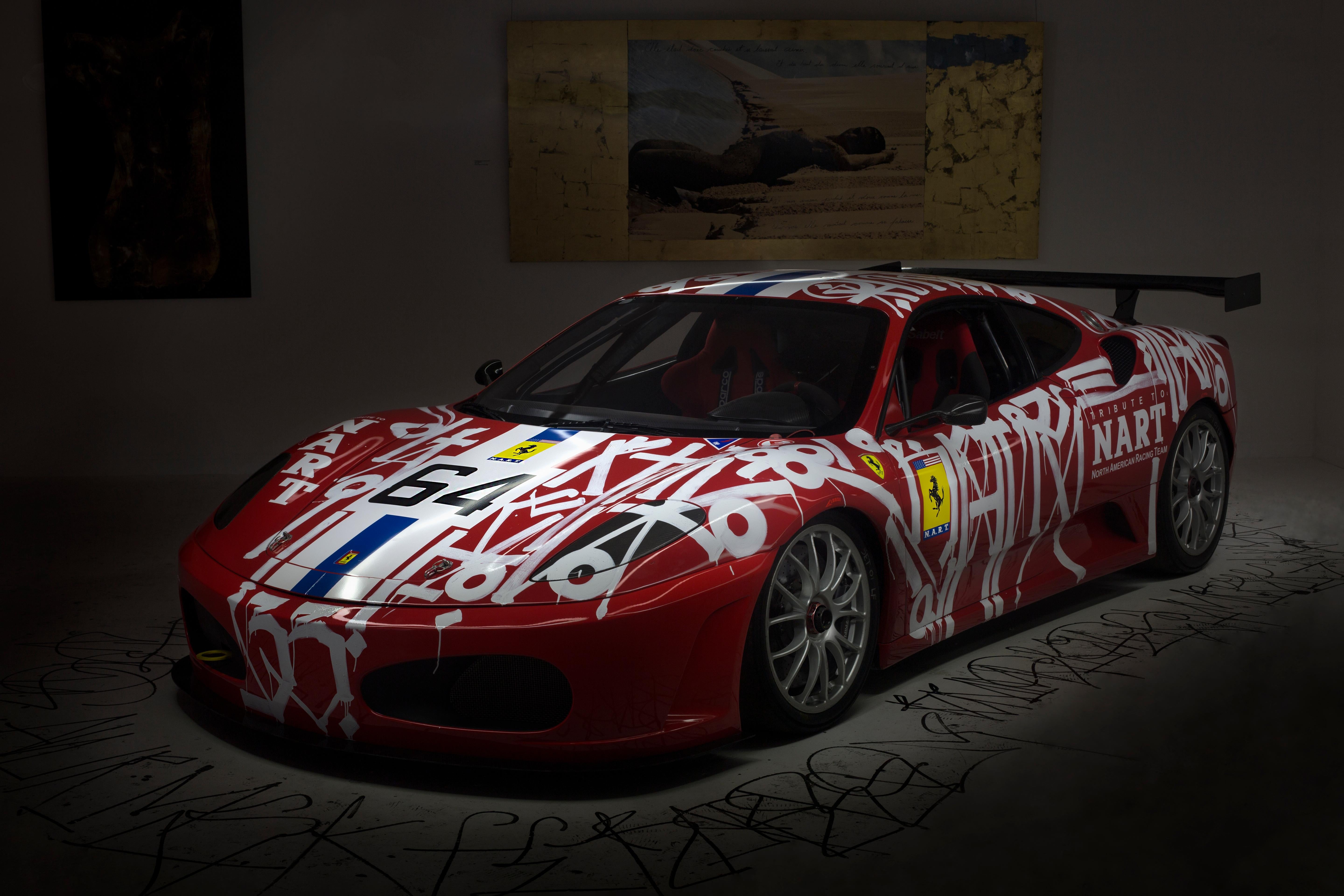  Ferrari F430 Challenge car that was turned into an art car by Marquis Lewis, also known as RETNA.

RETNA is known for his art that was inspired by Egyptian hieroglyphics and calligraphy from Asia and the Middle East. His styling can be seen across