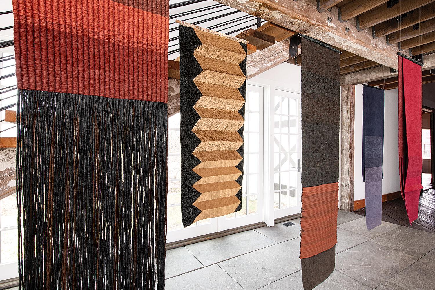 This handwoven contemporary textile sculpture, Tonos Rojos, was done by Chilean fiber artist, Carolina Yrarrázaval (b. 1960). Yrarrázaval explains her inspiration and technique: 

