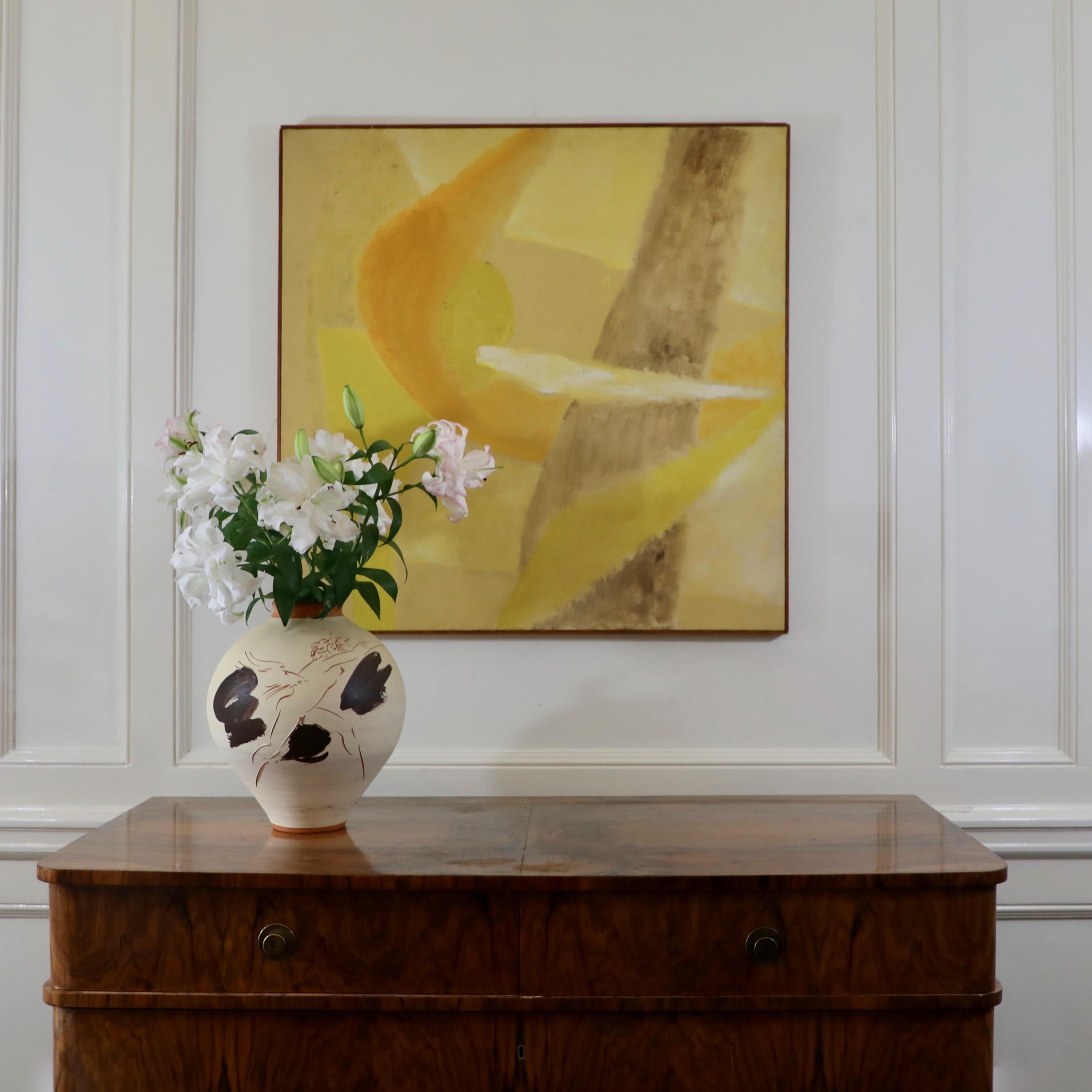 This is a mid century abstract oil on canvas in shades of yellow. It is large and impactful and really well done by the American artist Jacqueline Rozendaal Harvey. Completed in 1959 this work is really indicative of the 1950s abstract expressionist