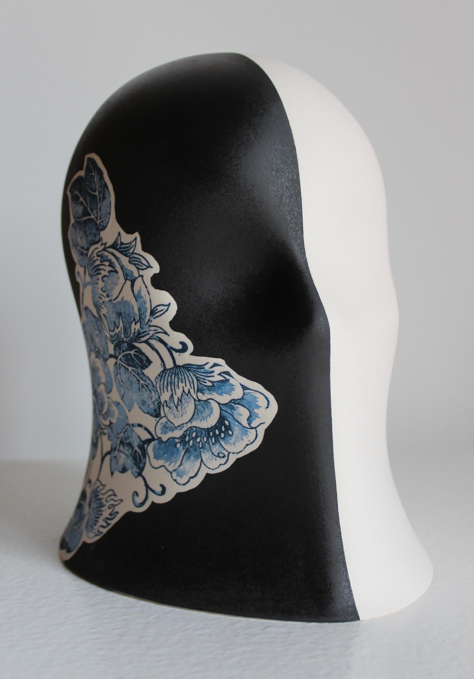 Black/White Embellished Veil, Chloe Rizzo Sculpture Porcelain Female

A porcelain and glaze sculpture by artist Chloe Rizzo.  Her "Veil Series" depicts a female head veiled by an overall shroud.  Each unique veil in the series is an exploration of