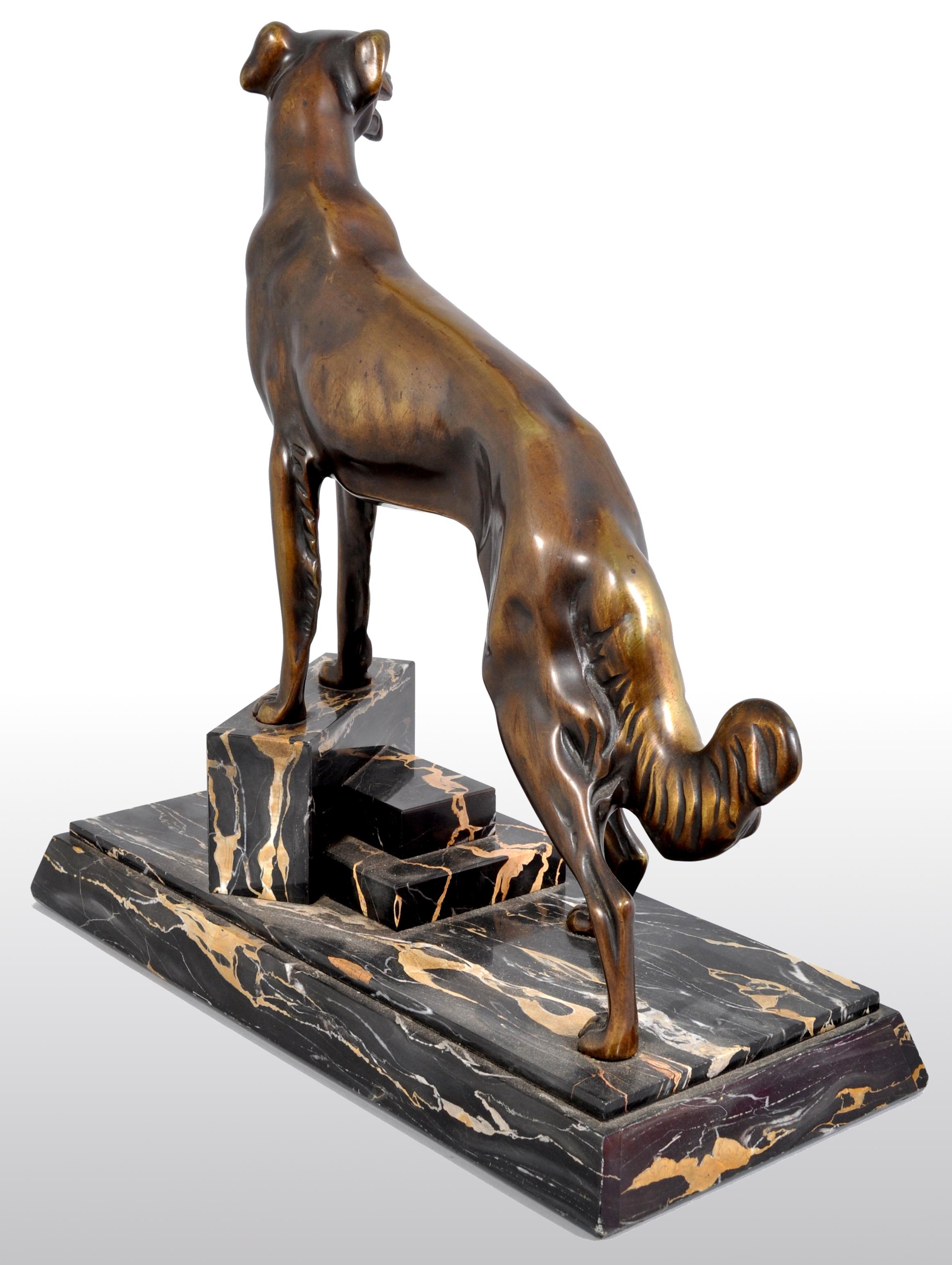 Antique Art Deco Bronze of a Russian Borzoi/Wolfhound/Dog by Louis-Albert Carvin (1875-1951). This very stylish bronze depicts a  handsome Russian Wolfhound (Borzoi), proudly standing on a stepped and veined marble plinth. The bronze signed 