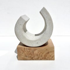 You III, Richard Fox. Small abstract stone sculpture on oak plinth, carved