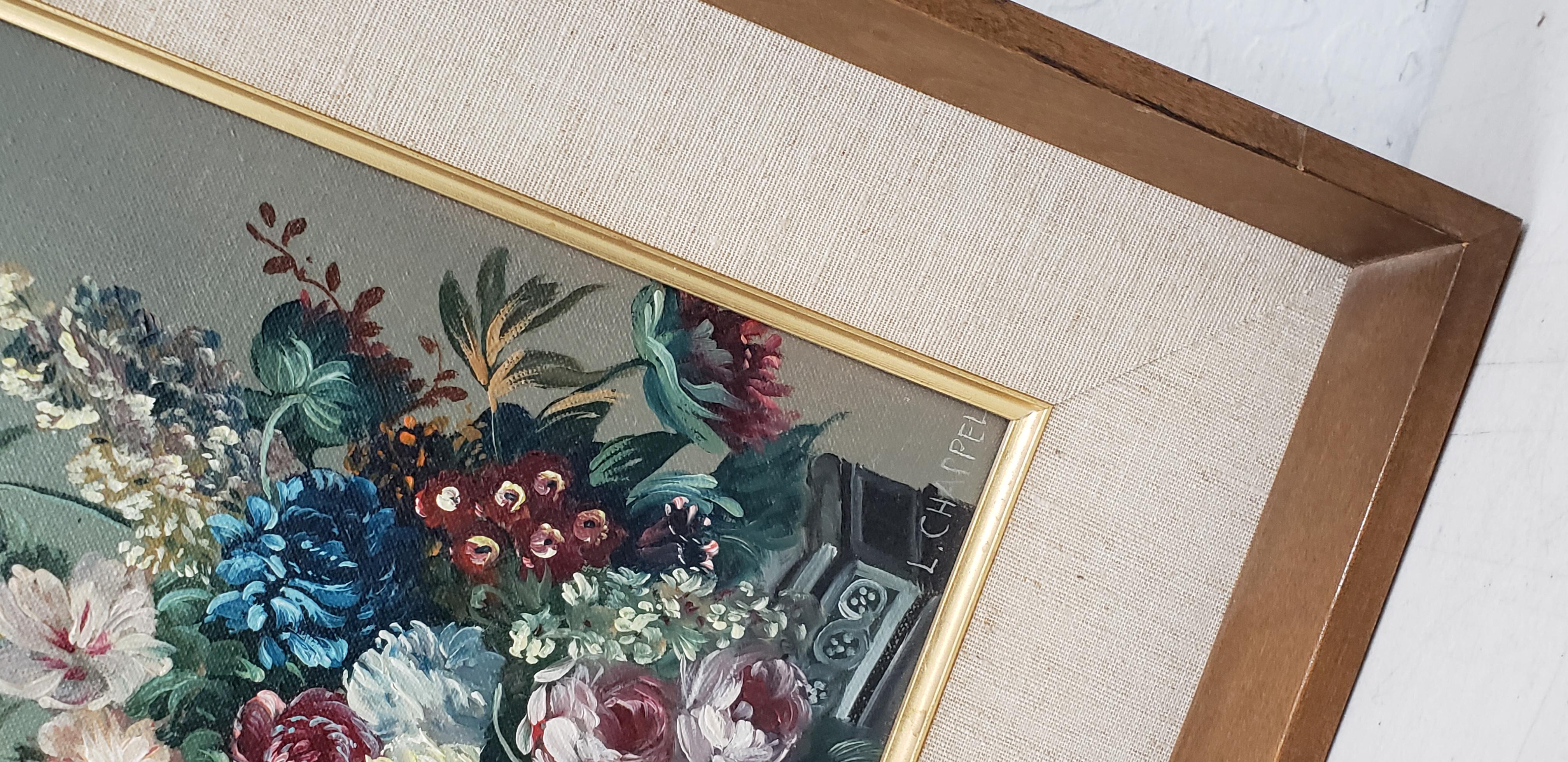 Louis Emiel Chappel (1888-1963) floral still life oil painting, circa 1950s

Beautiful full basket bouquet of flowers on a pedestal by listed artist Louis Chappel.

Original oil on canvas. Dimensions 8.5
