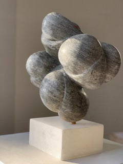 'Ballegan', Black Alabastar on scaglione alabaster base with brass turning pin