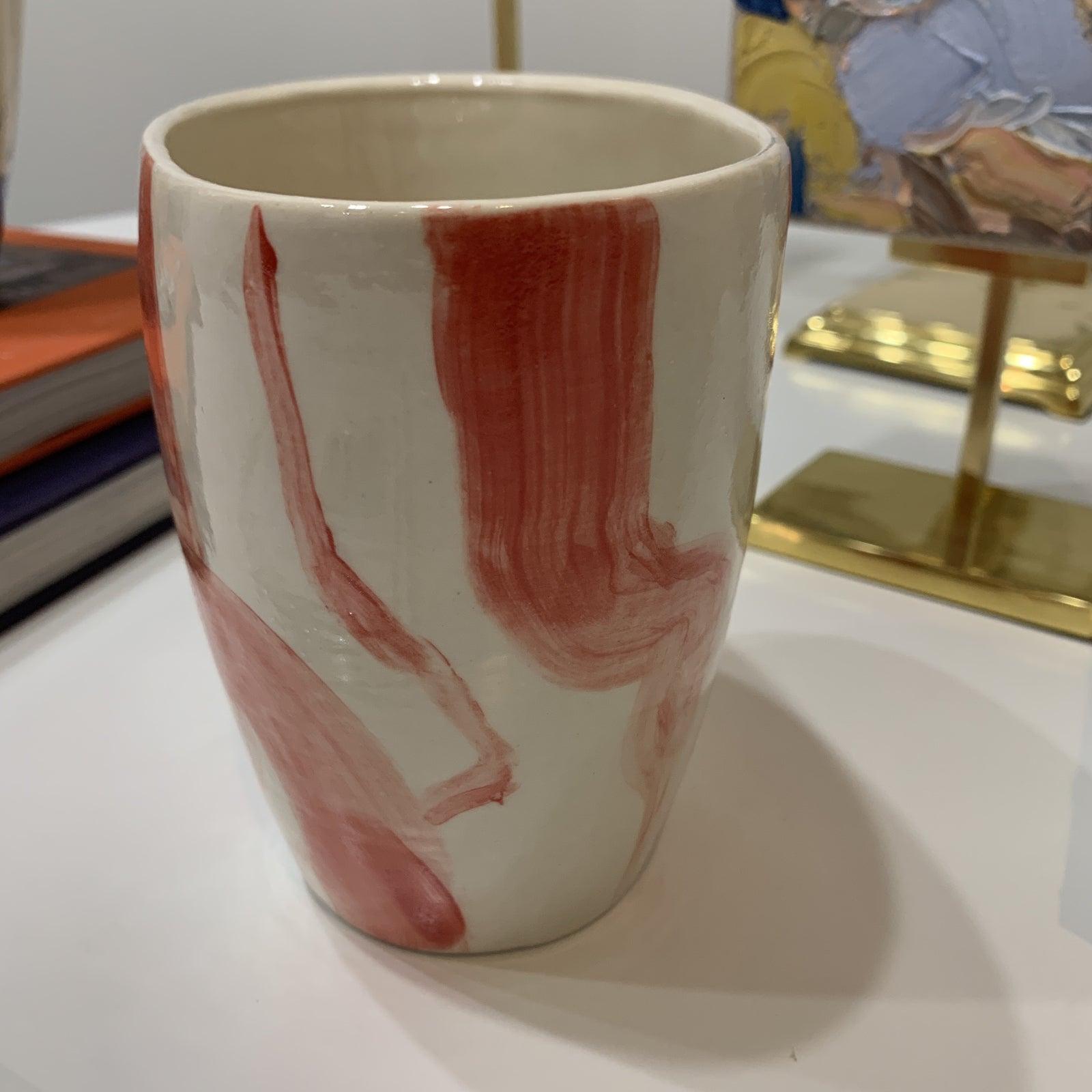 Ceramic Handpainted Vase by artist, Stephanie Wheeler 
Rich Coral Red and White 

Bio:
Somewhere between impressionism and abstraction, Stephanie Wheeler’s paintings take on a life of their own. She began her career in Atlanta as a classic painter