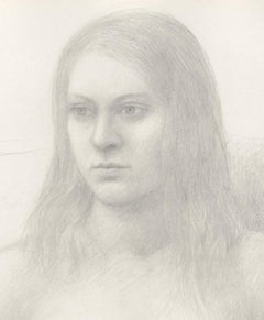 Nu assis sur une chaise