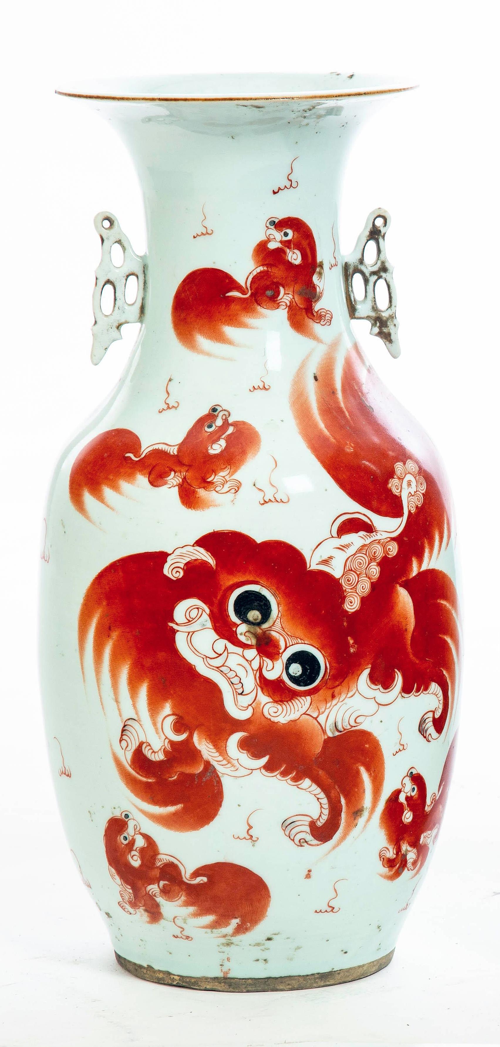 Pair of Antique Hand Painted Chinese Vases with Foo Dogs and Inscriptions
China, early 20th century
Porcelain
17 x 8 x 8 inches

Painted in iron red, these Foo Dogs or Imperial Guardian Lions are strong Feng Shui protection symbols which were