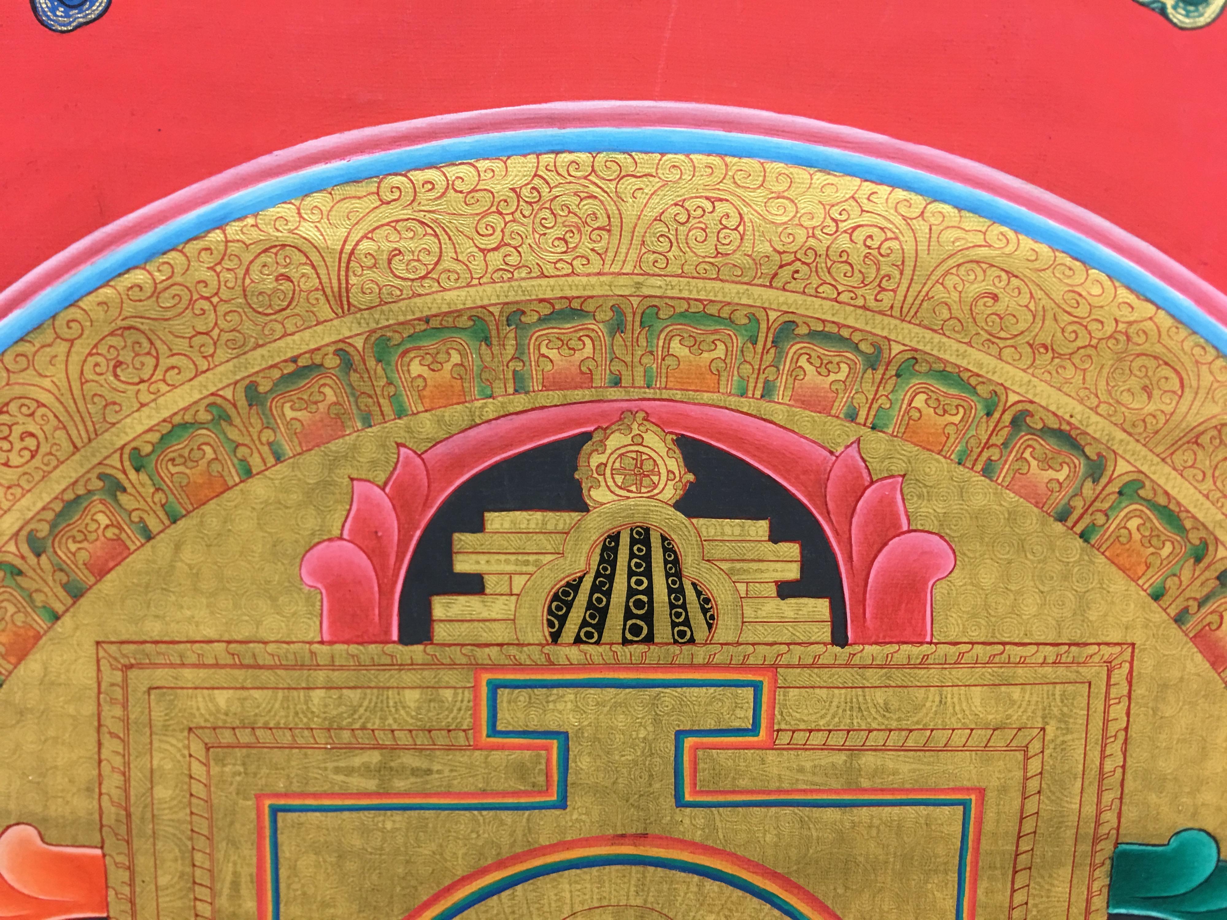 Le thangka Gold Bajra Mandala est unique en son genre, peint à la main sur toile, avec au centre une figurine de tara vert, symbole de la posétivité