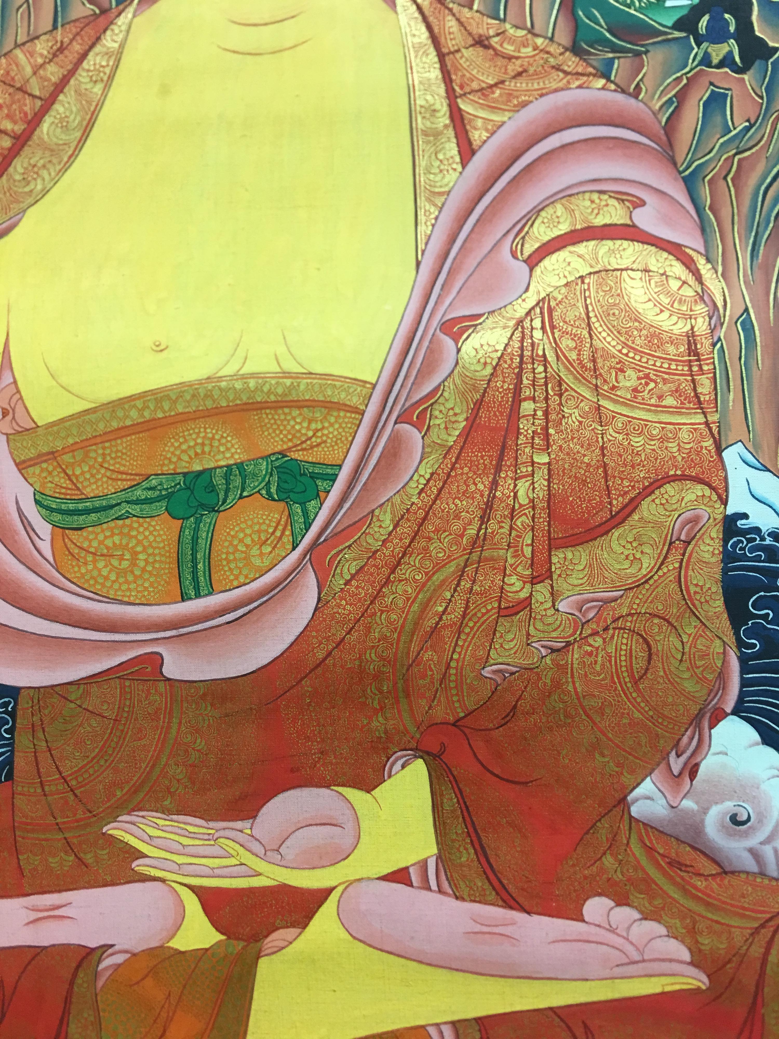 Thangka peint à la main sur toile avec une touche d'or véritable. Dans ce thangka, Bouddha médite sur un trône de lotus. En arrière-plan, les montagnes enneigées représentent l'Himalaya. Le mot 