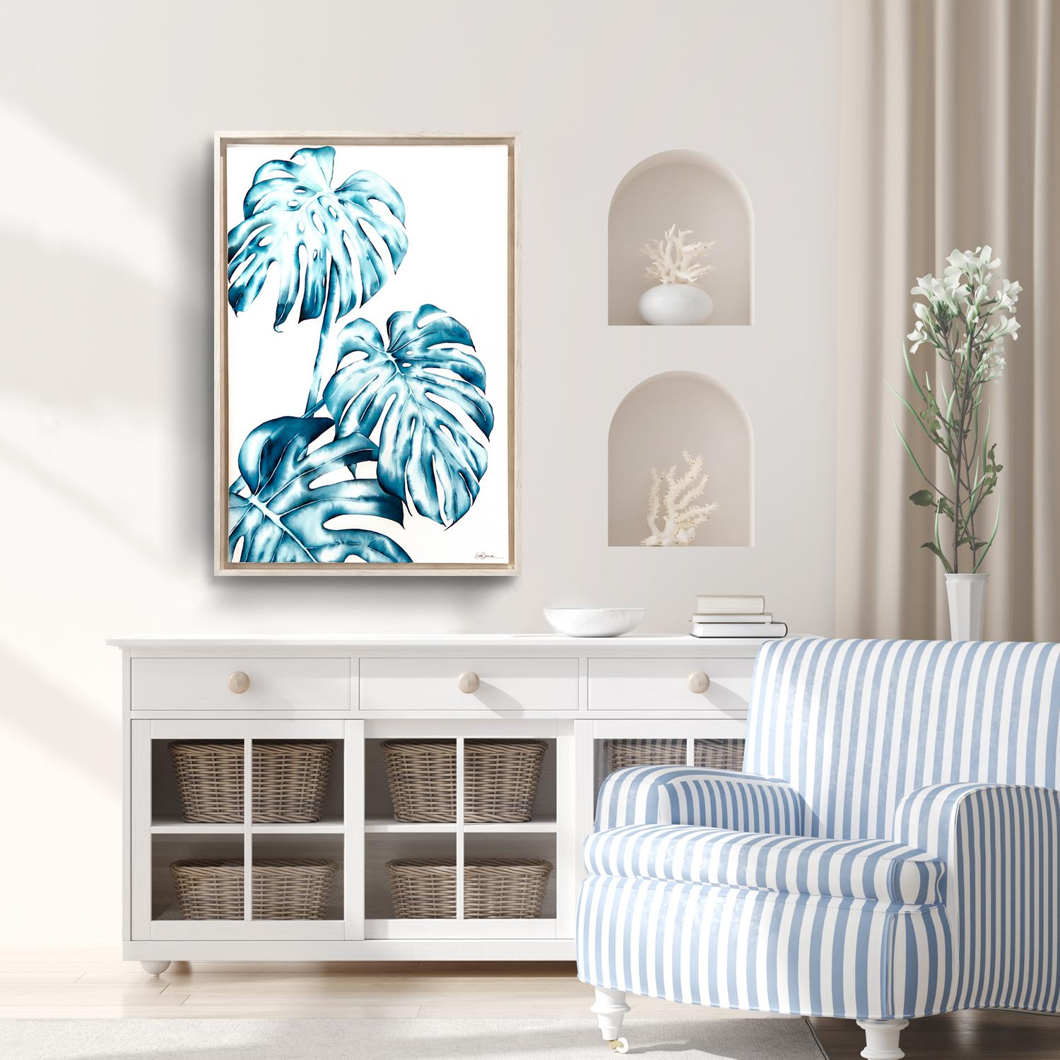 ‘Monstera Trio' Framed Canvas Original Painting features tropical monstera leaves in vibrant tones of teal, and white. The epitome of coastal sophistication, Laurie Duncan’s watercolor masterpieces are so intricately articulated they appear