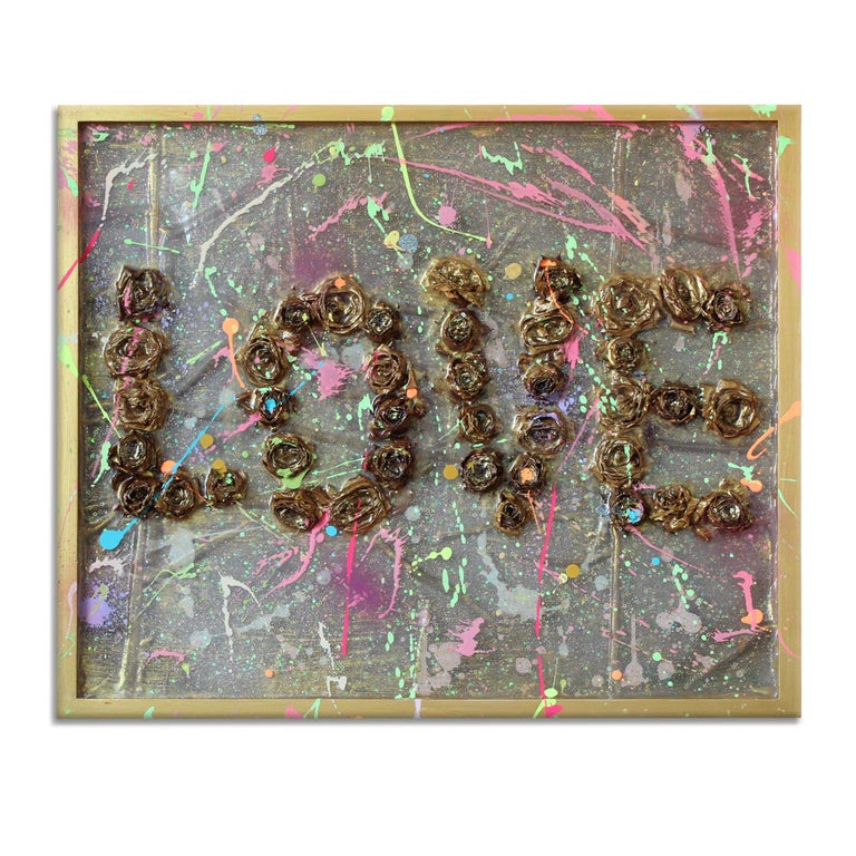 'Love 1.1' Framed Canvas Original Pop Art features dried rosebuds forming the word "Love," layered with resin and then adorned with colorful paint splatters in tones of pink, green, blue, orange, and purple. Introspective and playful Italian artist,