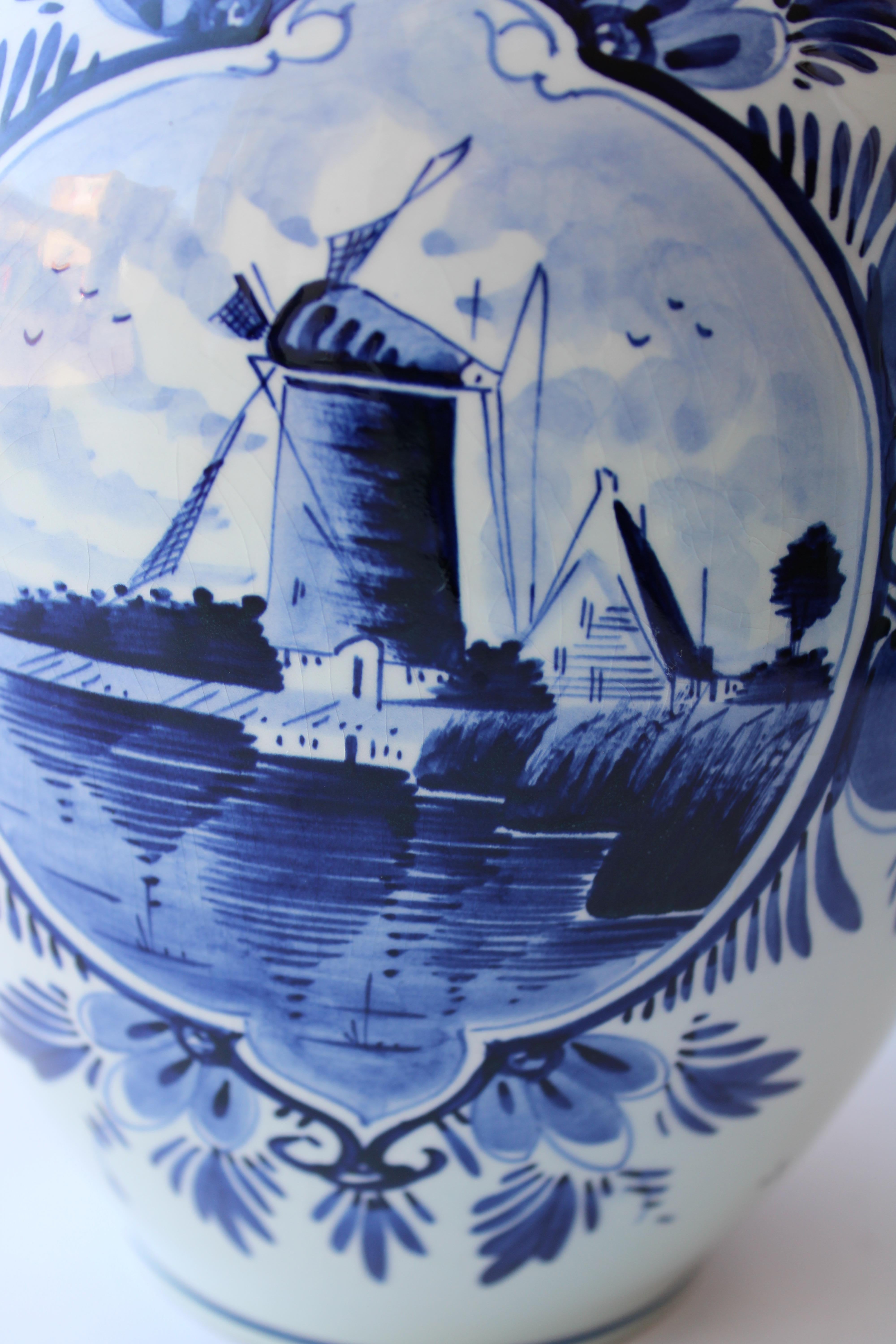 Delft blau handgemalt. Holland. Porcelain vase with windmill and flowers h 21 cm 1