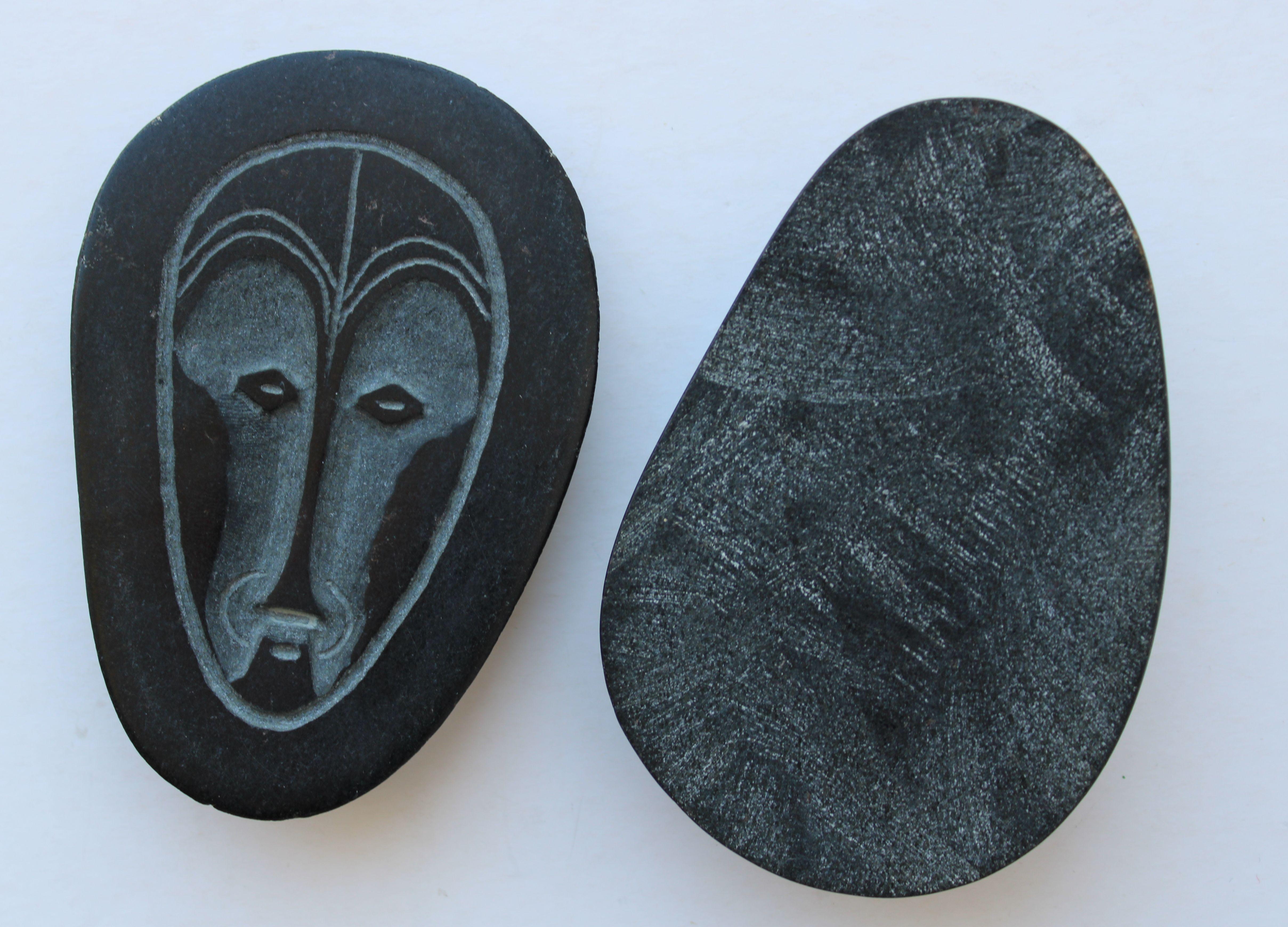 Zane Elerte Figurative Sculpture - StoneGod  Medal, brushed, polished granite, 75x11x40 mm 