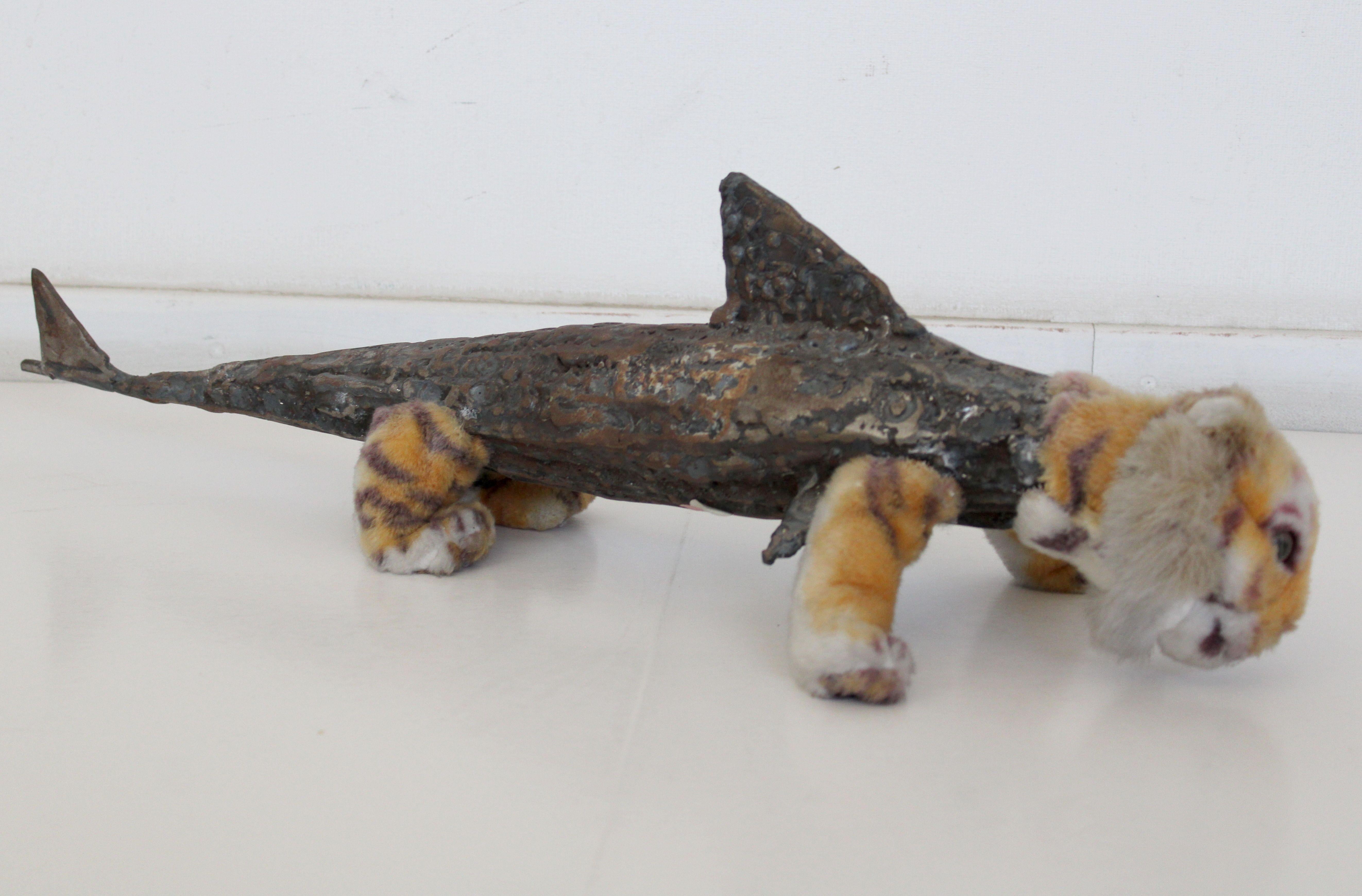 Artis Adians (1986)
Tigershark

2009. Metal fabric. 18x63x22 cm