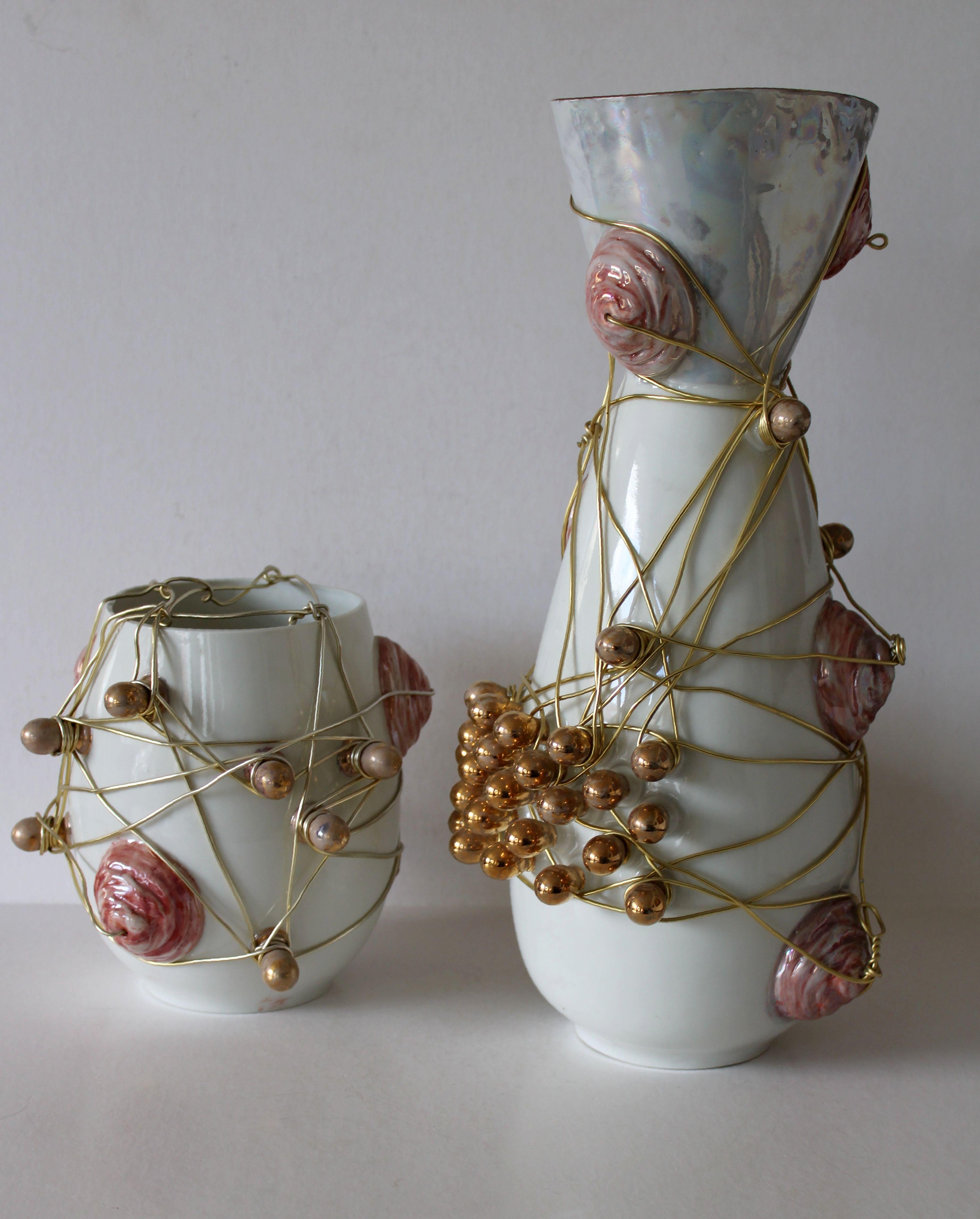 Vases with wires - set of two  2009, porcelain, wire, h 19.5 cm, h 43 cm