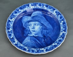 Assiette murale en porcelaine d
après le Portrait d
un jeune garçon au chapeau de Michael Boys