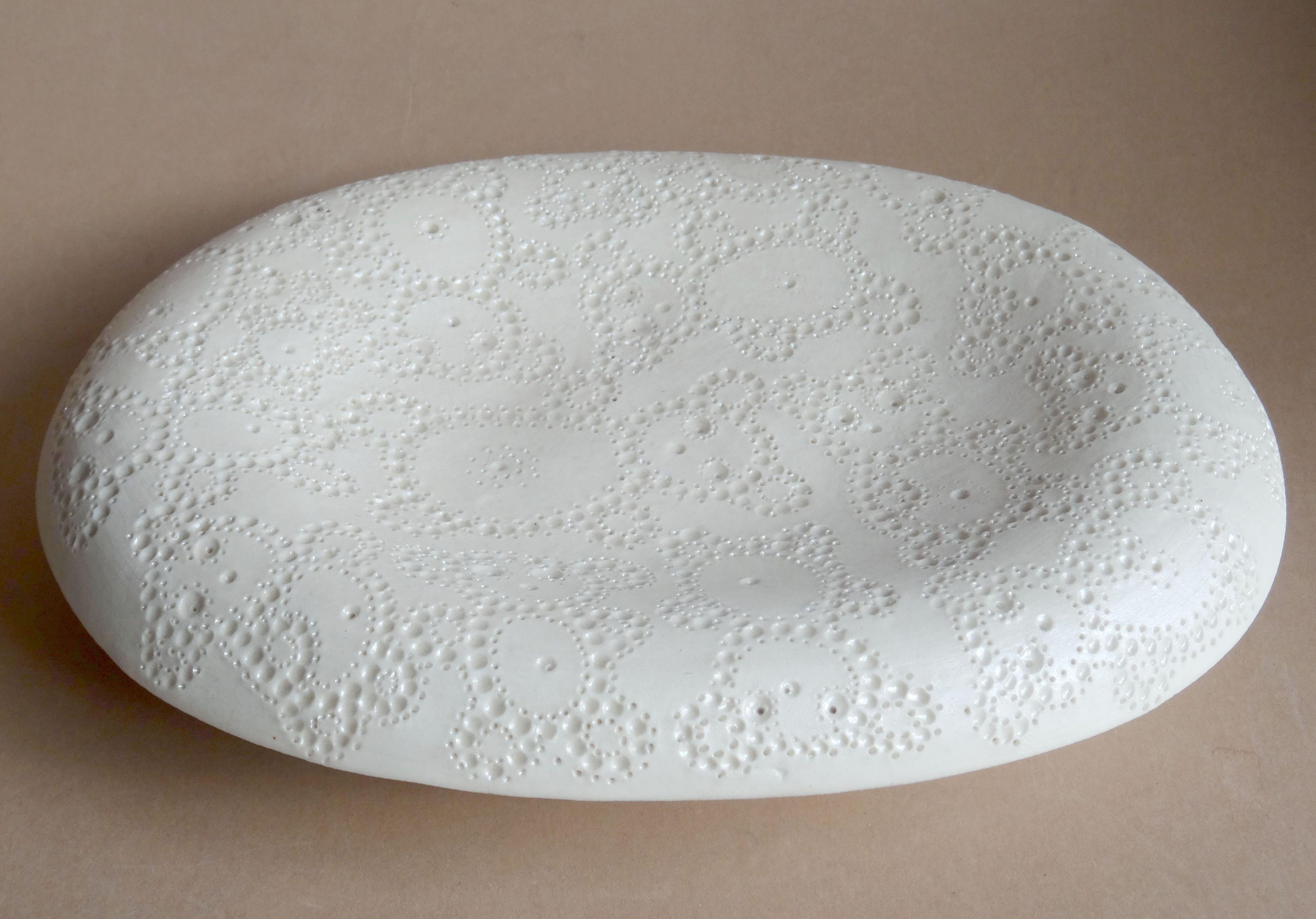 Elina Titane  Abstract Sculpture - White Musical plate with bear ornament. 2011, porcelain, 13x17 cm 