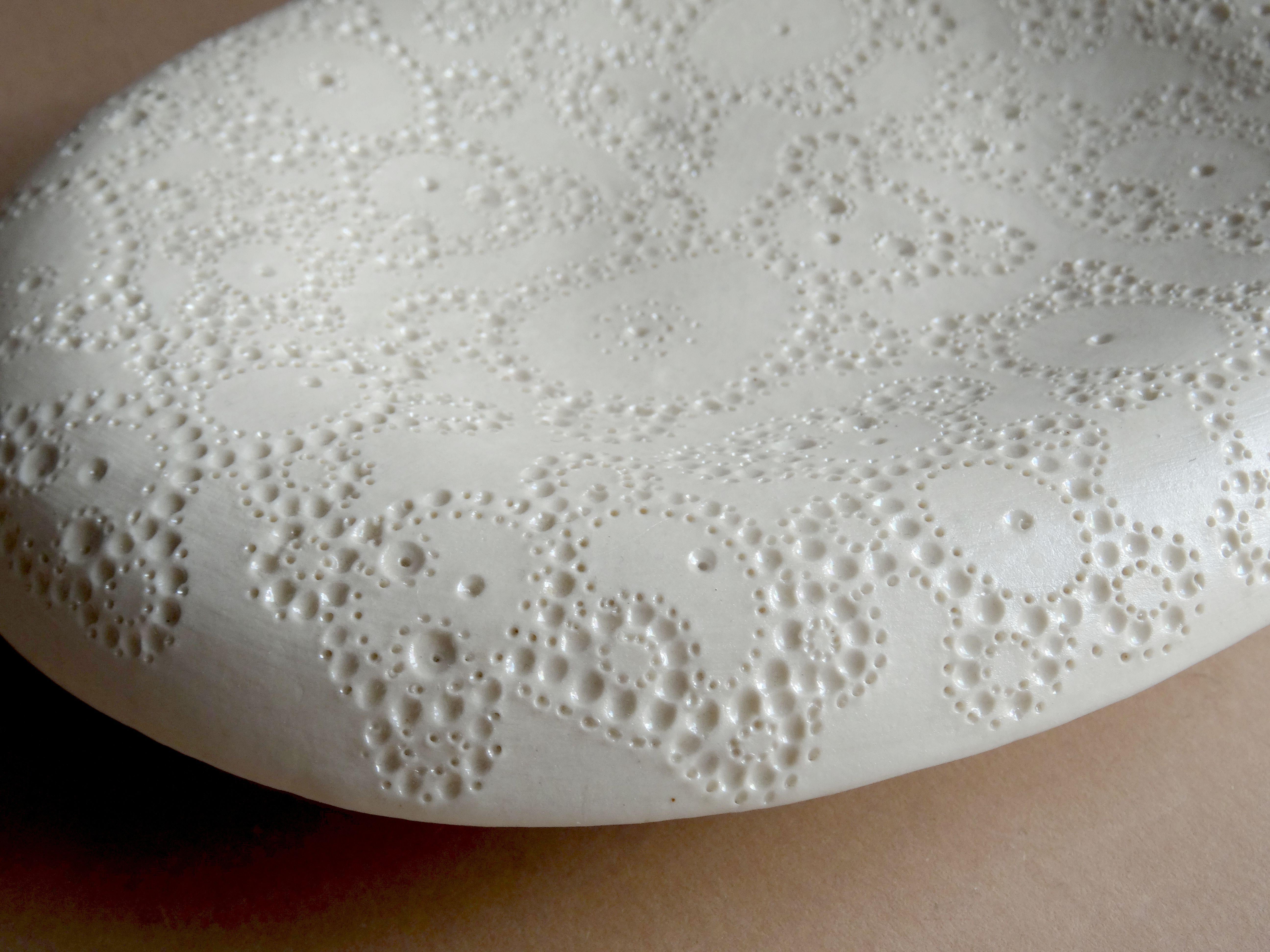 White Musical plate with bear ornament. 2011, porcelain, 13x17 cm  - Gray Abstract Sculpture by Elina Titane 