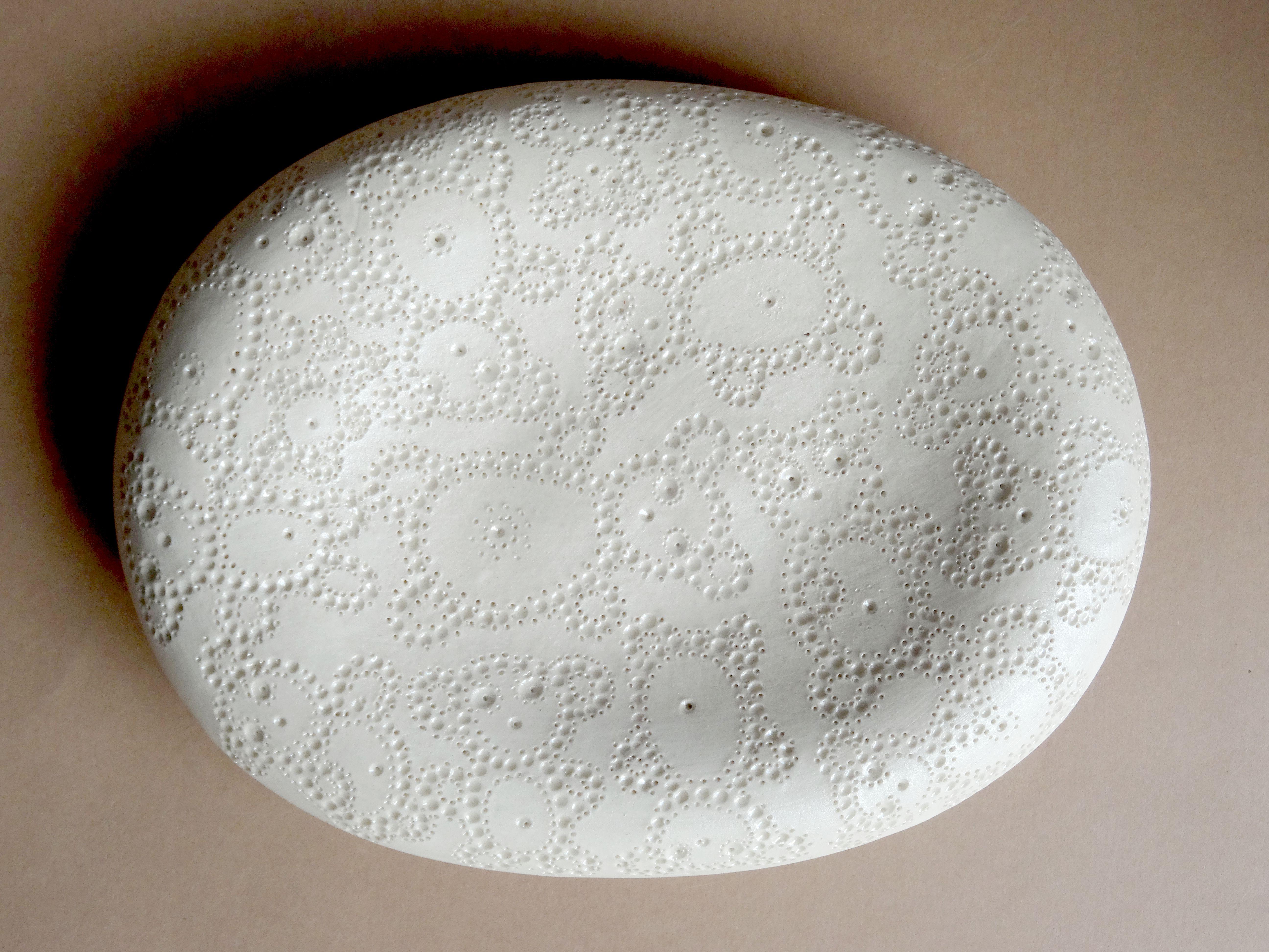 White Musical plate with bear ornament. 2011, porcelain, 13x17 cm  - Sculpture by Elina Titane 