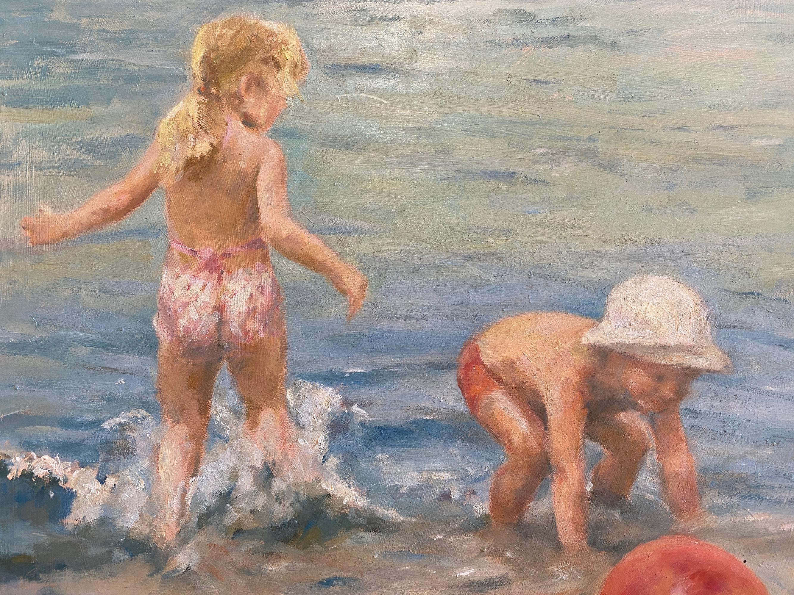 In Stobbe's oil on masonite painting, two children happily play splashing in the water at the beach with their beach ball in the sand, unaware of the viewer. The seaside beach scene is in a realistic, painterly style with the predominant colors of