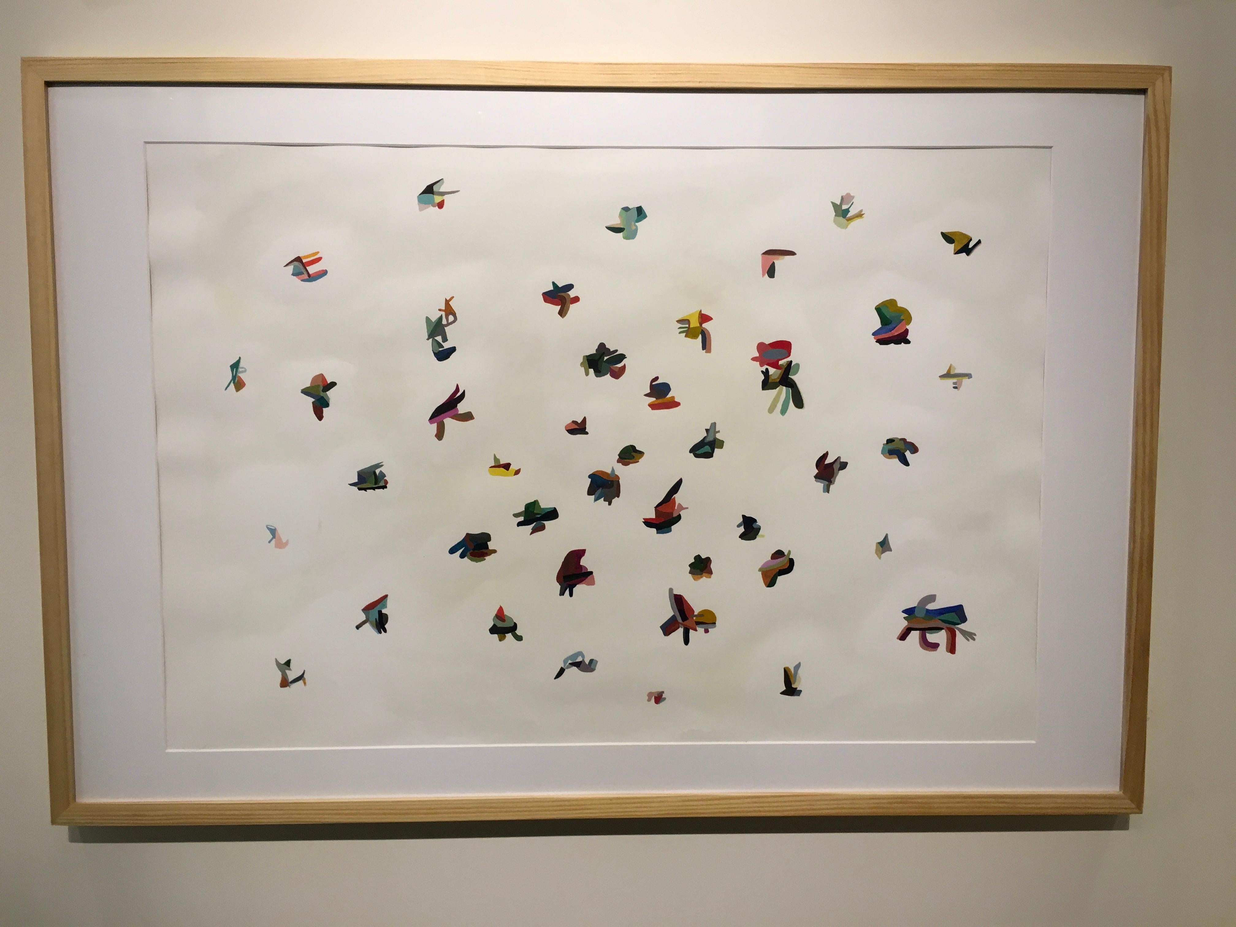 This framed 27" x 37" watercolor painting by Irish artist, Peter Healy is from the 'In Flux' Pandemic Collection. The painting comes vibrantly alive as the small painted shapes and forms almost vibrate with the desire to dance on the white paper. No