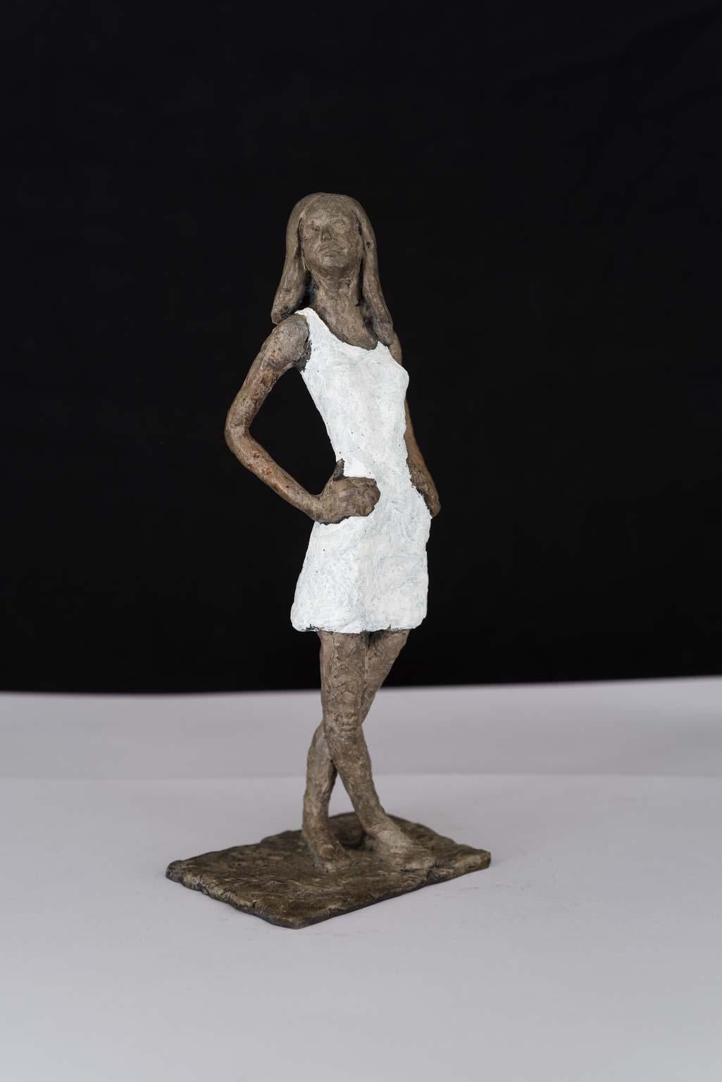 Susanne Kraisser Figurative Sculpture - Girl in Mini - contemporary bronze sculpture, nude female with white dress