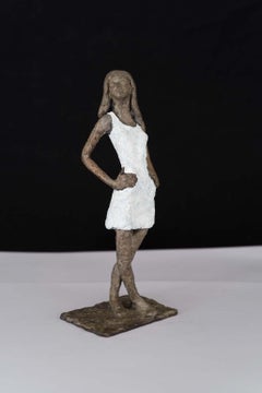 Girl in Mini - contemporary bronze sculpture, nude female with white dress