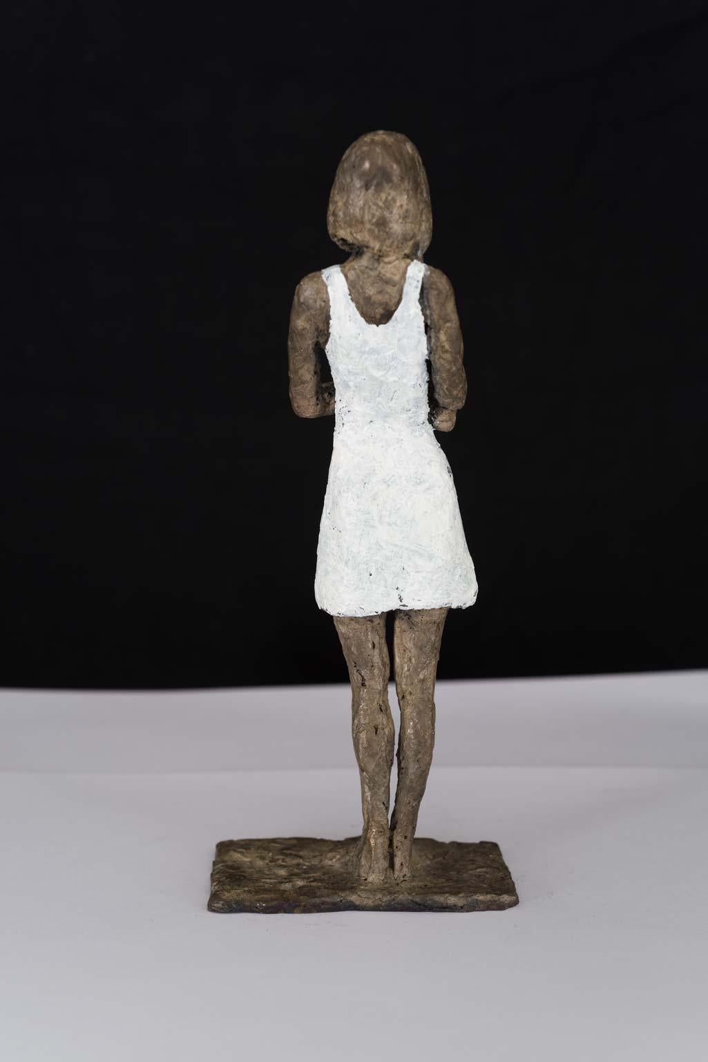 Girl in Mini Dress - contemporary bronze sculpture, nude female with white dress - Sculpture by Susanne Kraisser