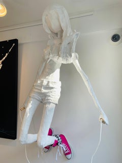 Wall Mounted Sculpture of a Girl with a Skipping Rope. Title - The Skipping Girl