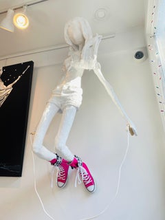 Wall Mounted Sculpture of a Girl with a Skipping Rope. Title - The Skipping Girl